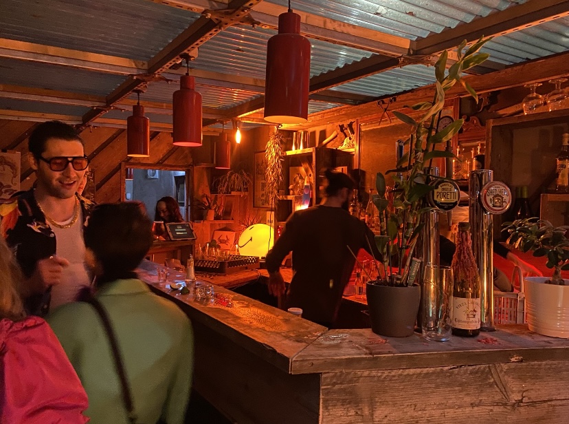 Vibrant bar in Loveshack, ideal for networking and social gatherings.