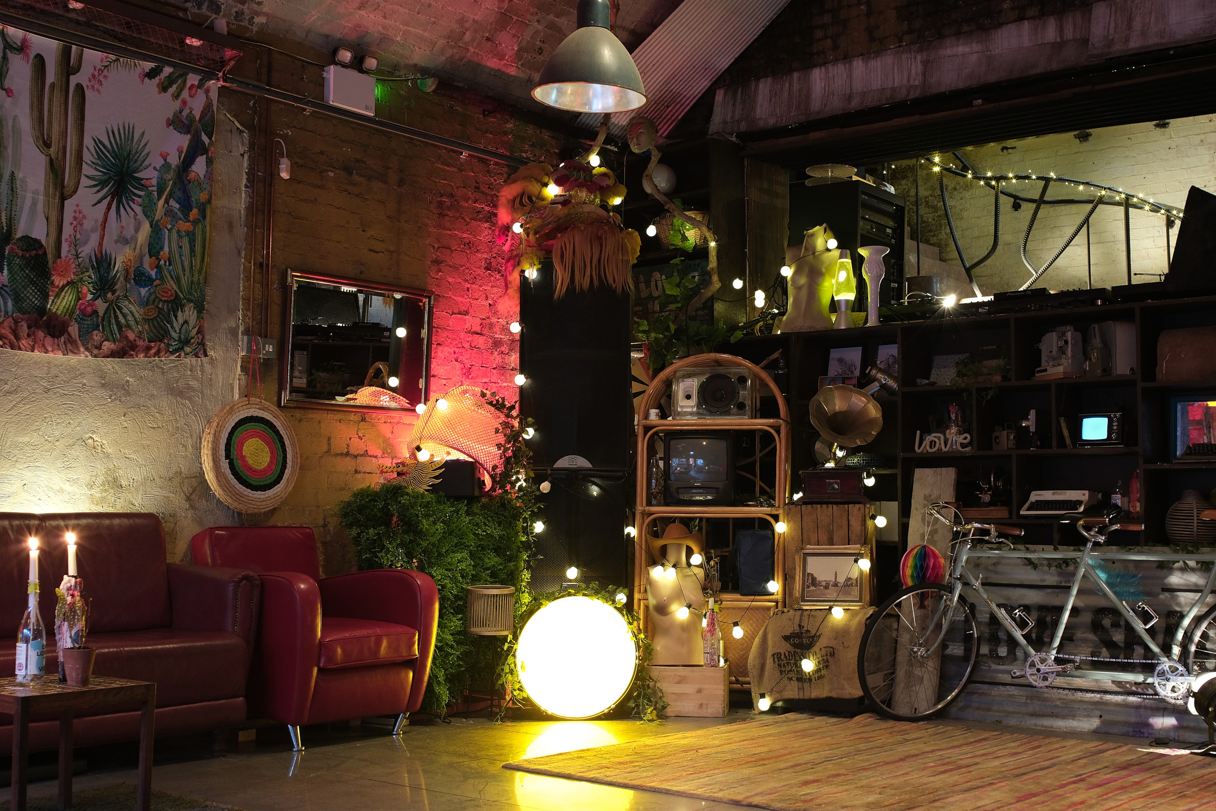 Cozy event space with eclectic decor, ideal for networking and workshops in Loveshack.