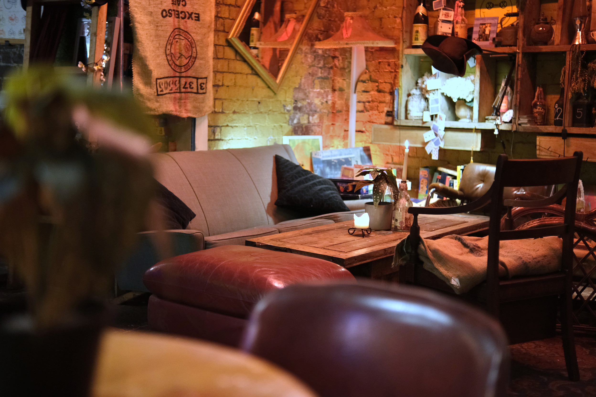 Cozy lounge in Loveshack, perfect for intimate gatherings and brainstorming sessions.