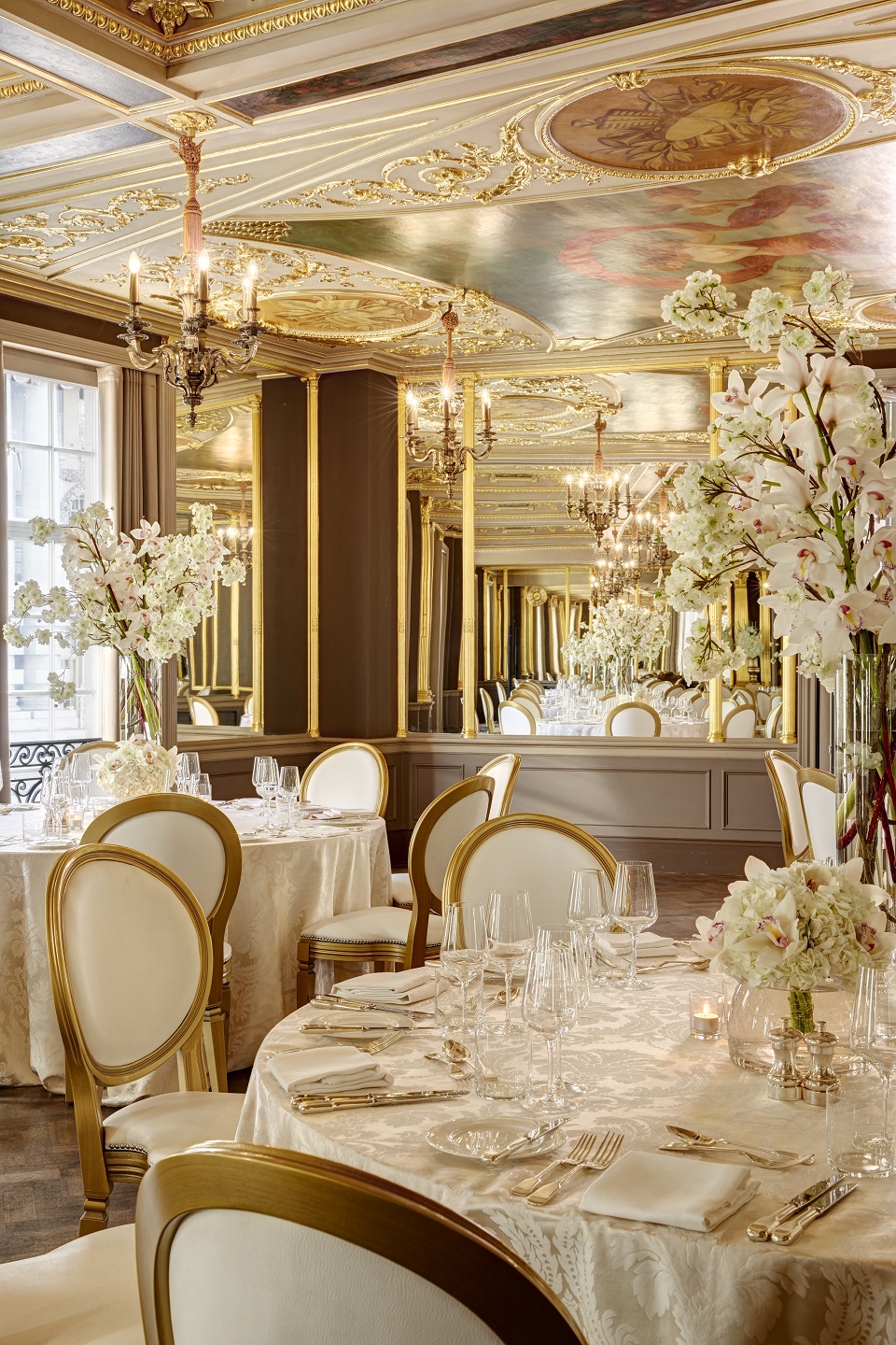Elegant Pompadour Ballroom with fine china, ideal for upscale events and formal dinners.