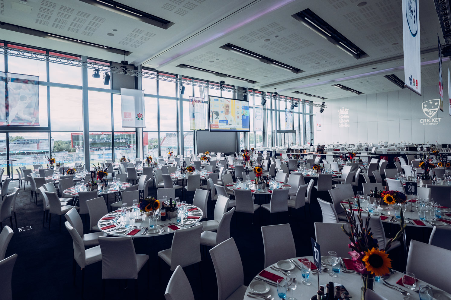 Elegant dinner setup at The Point, Emirates Old Trafford for corporate events.