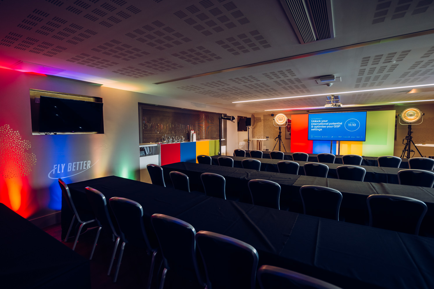 Emirates Lounge meeting room with AV tech, ideal for corporate events and workshops.
