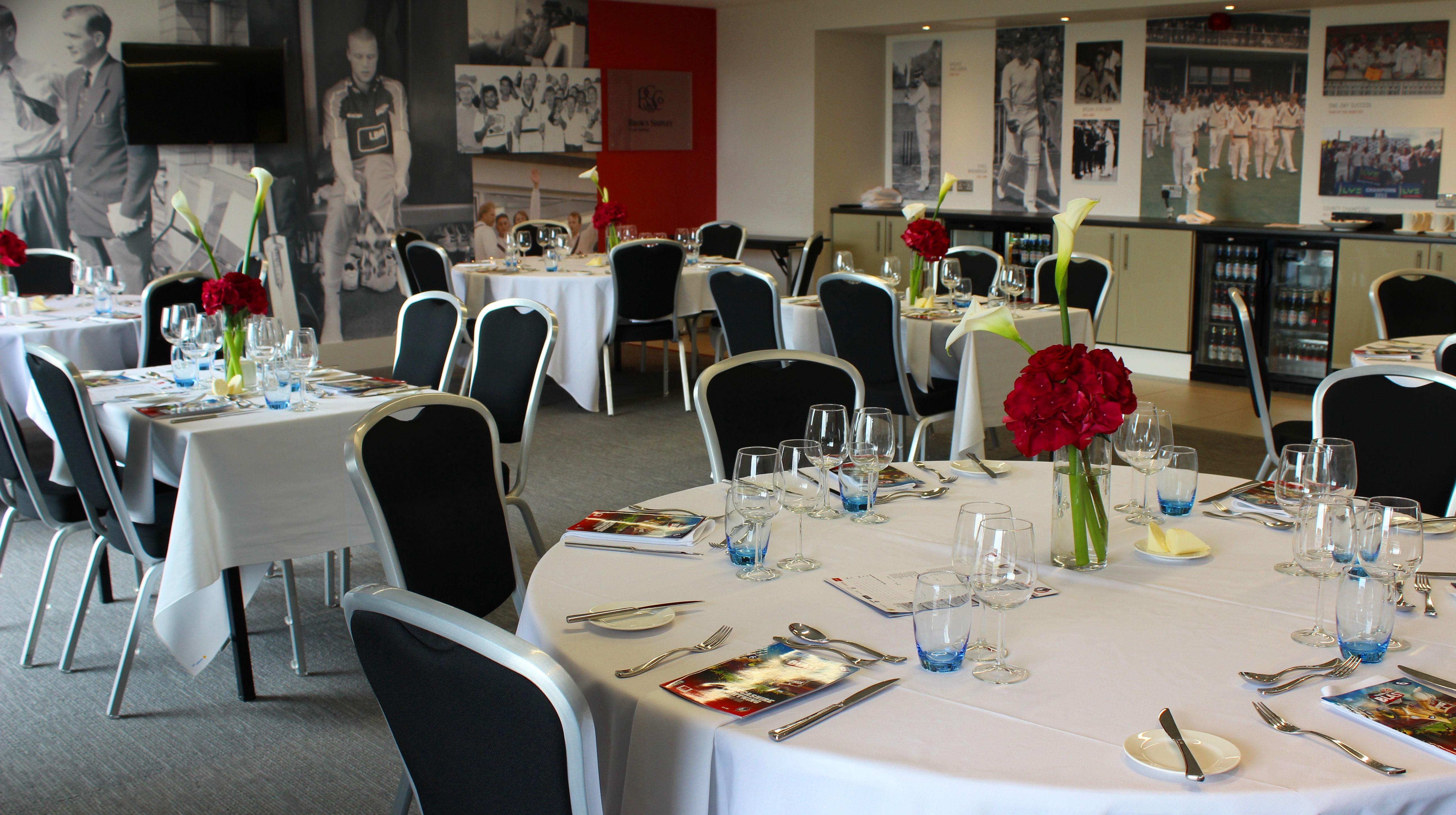 Elegant Club Suite at Emirates Old Trafford, perfect for corporate events and banquets.