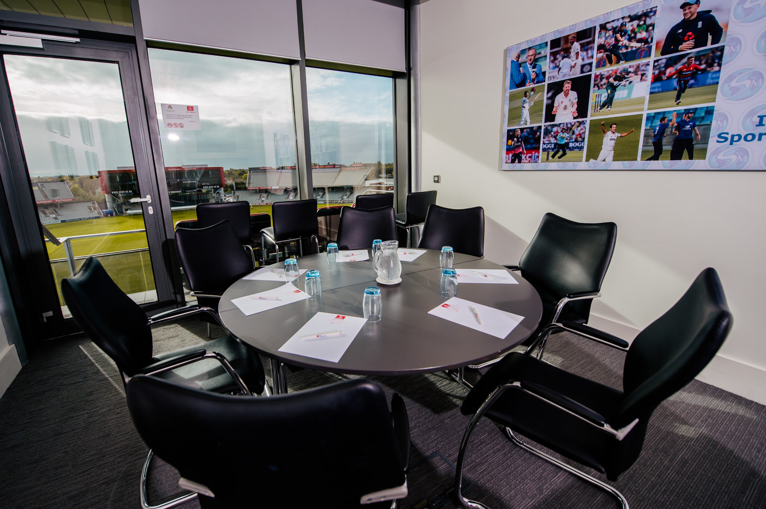Executive Boxes at Emirates Old Trafford, round table meeting room for corporate events.