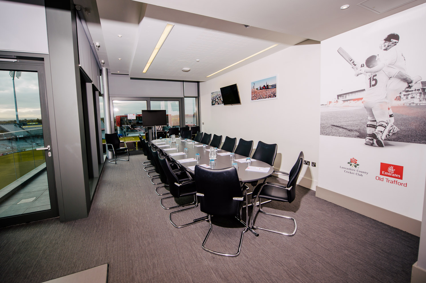 Modern conference room in Emirates Old Trafford for corporate meetings and events.