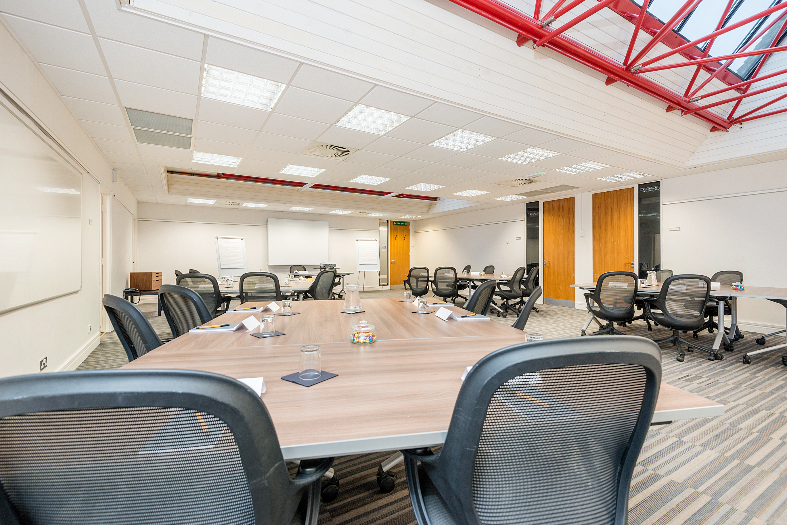 Modern meeting room at The Stratford, New Place Hotel, Hampshire - ideal for conferences and brainstorming.