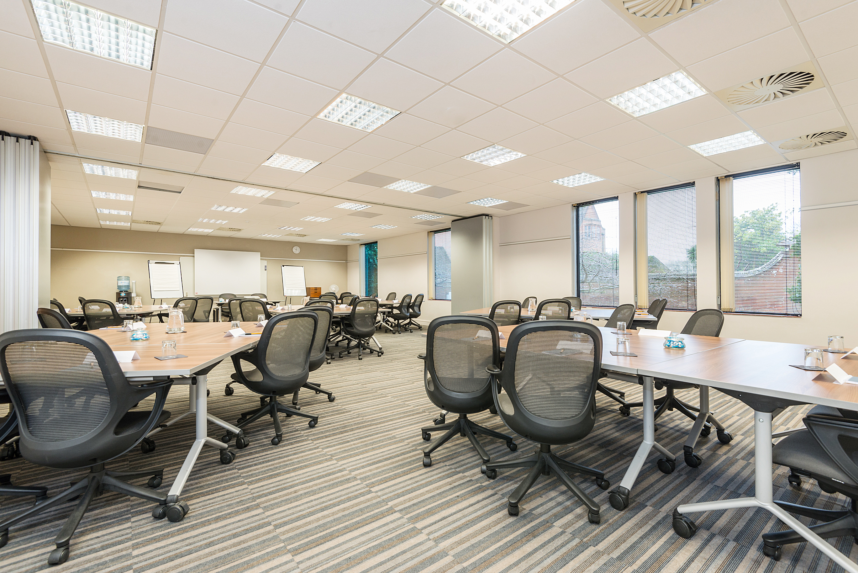 Versatile meeting room at The Warwick in New Place Hotel, perfect for corporate events.