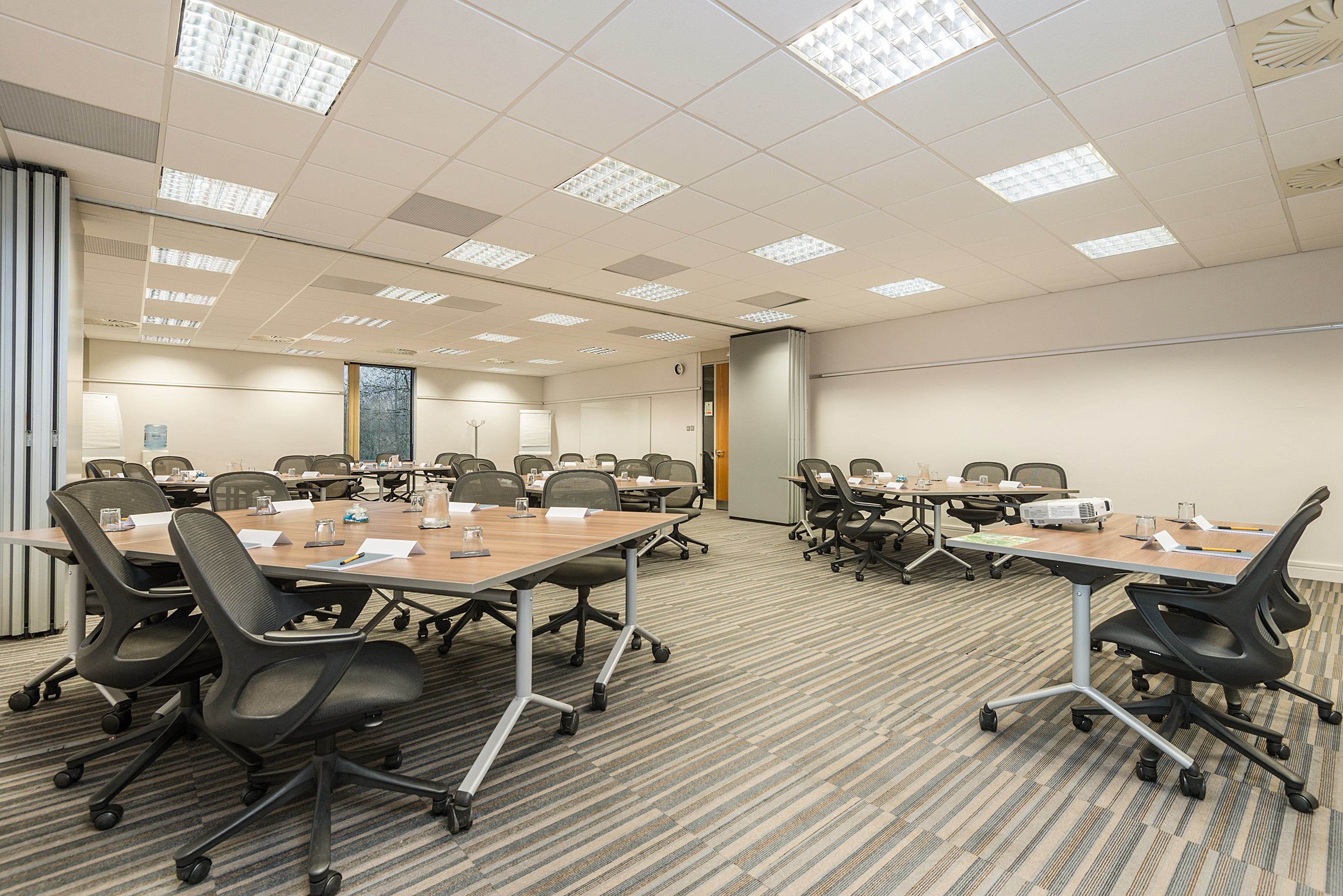 Meeting room at The Warwick in New Place Hotel, Hampshire, designed for collaboration.