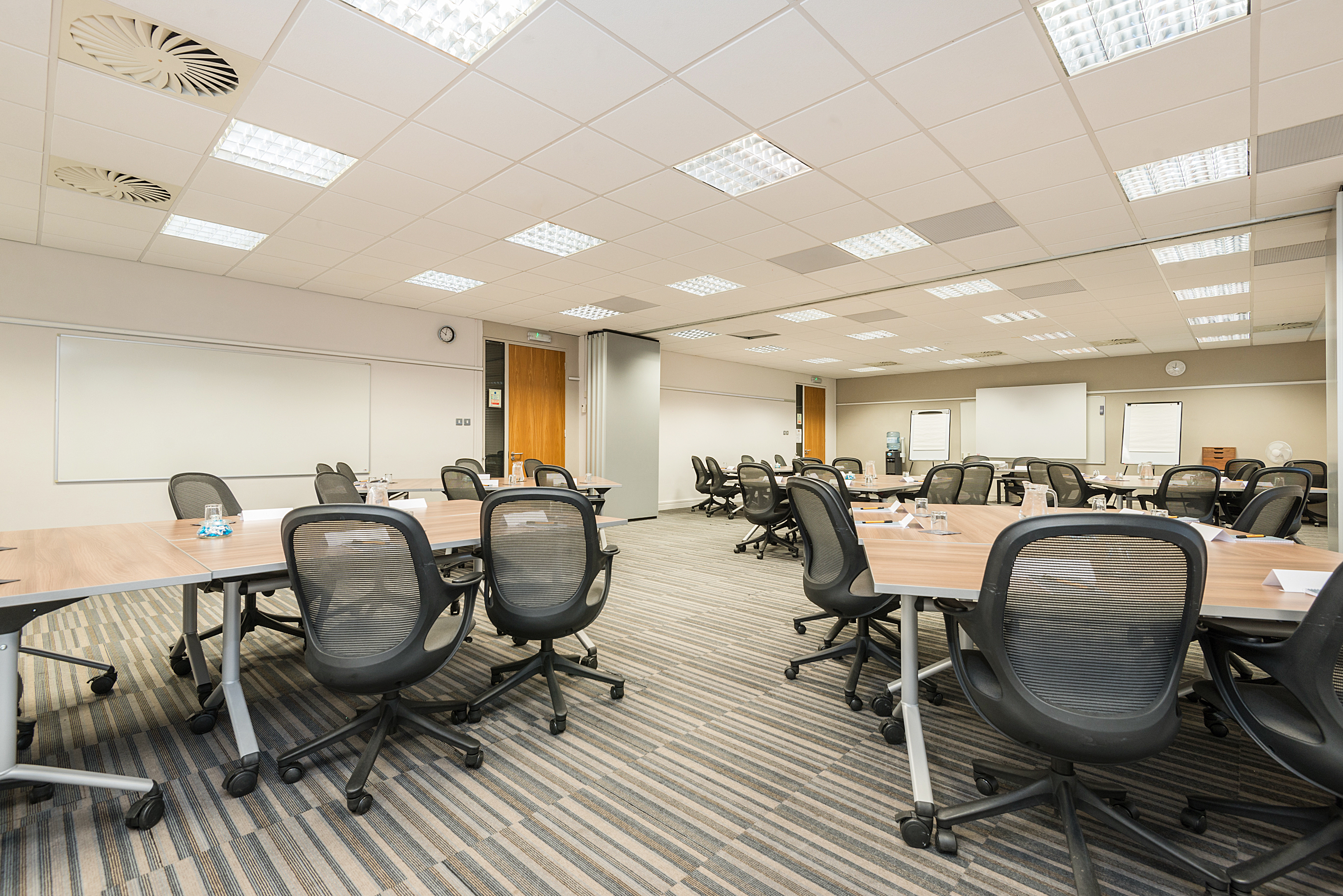 Meeting room at The Warwick in New Place Hotel, Hampshire - ideal for workshops and presentations.