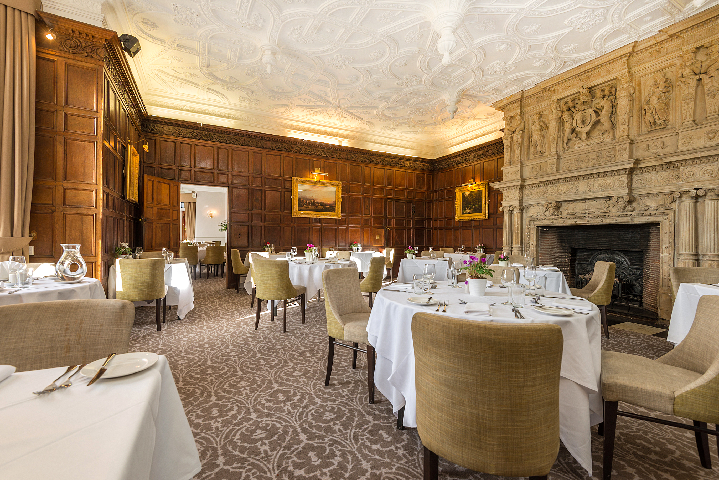 Elegant dining room in The Bristol Room, New Place Hotel, perfect for upscale events.