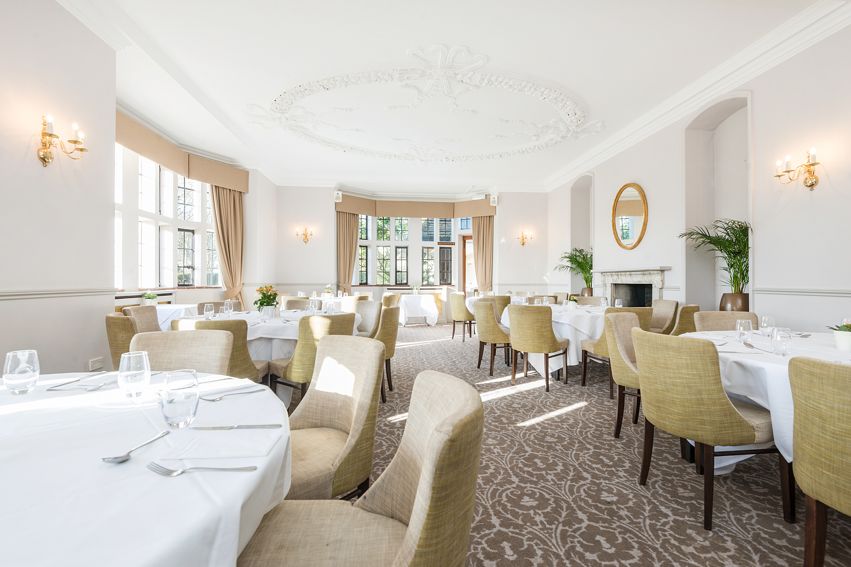 Elegant dining room at New Place Hotel, perfect for corporate meetings and intimate gatherings.