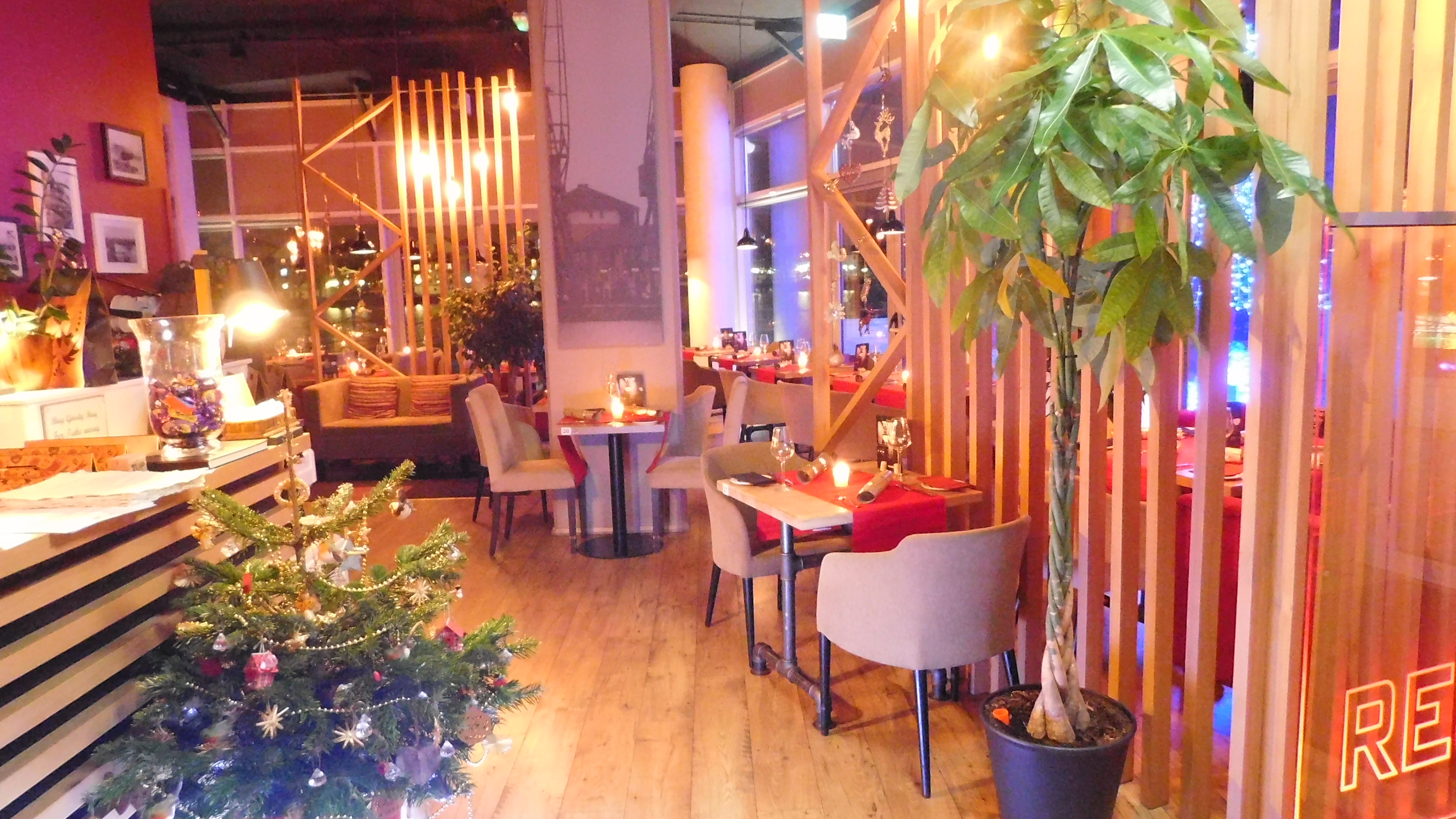 Cozy event space with warm lighting, ideal for small meetings and holiday parties.