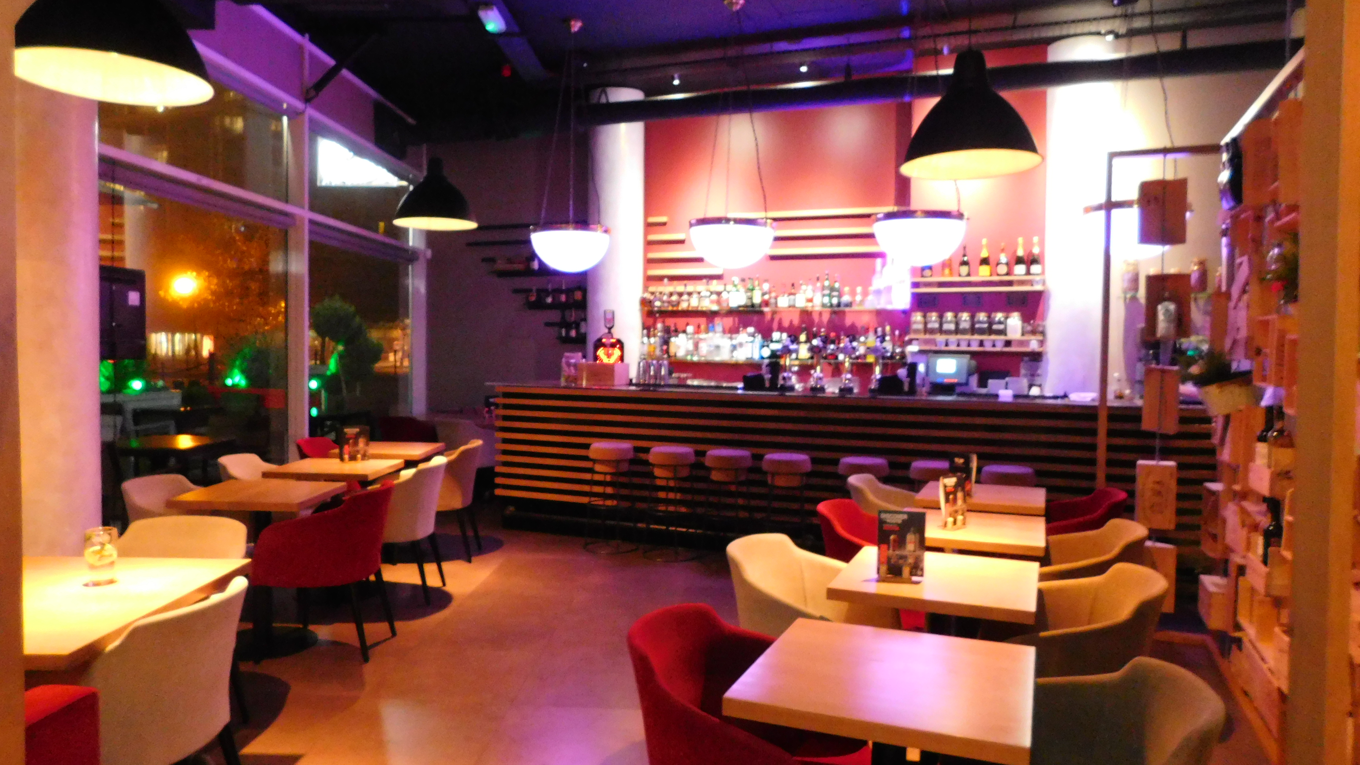Modern venue with ambient lighting for intimate gatherings and networking events.