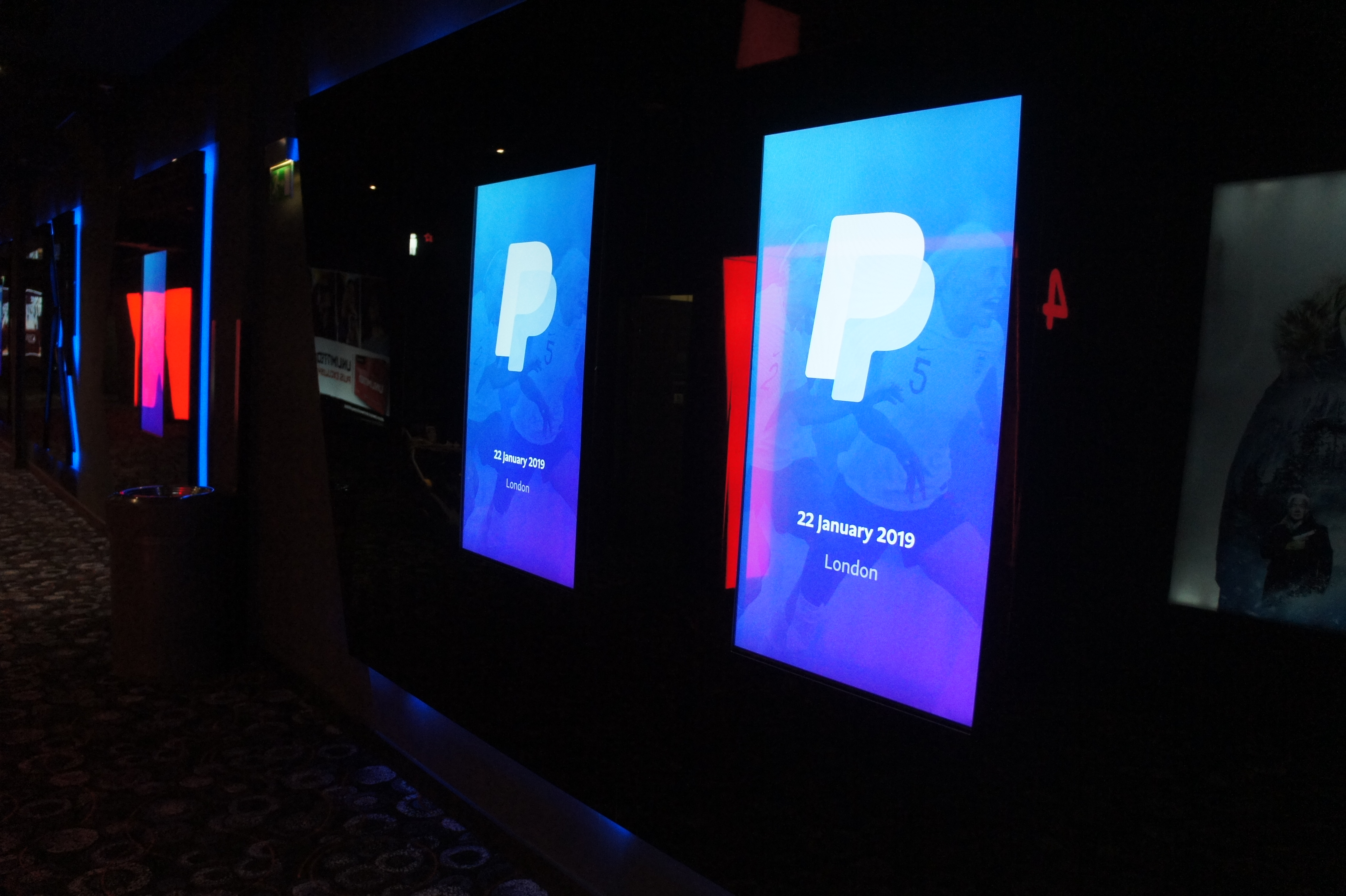 Sleek digital display at Cineworld O2 Greenwich for a vibrant conference event.