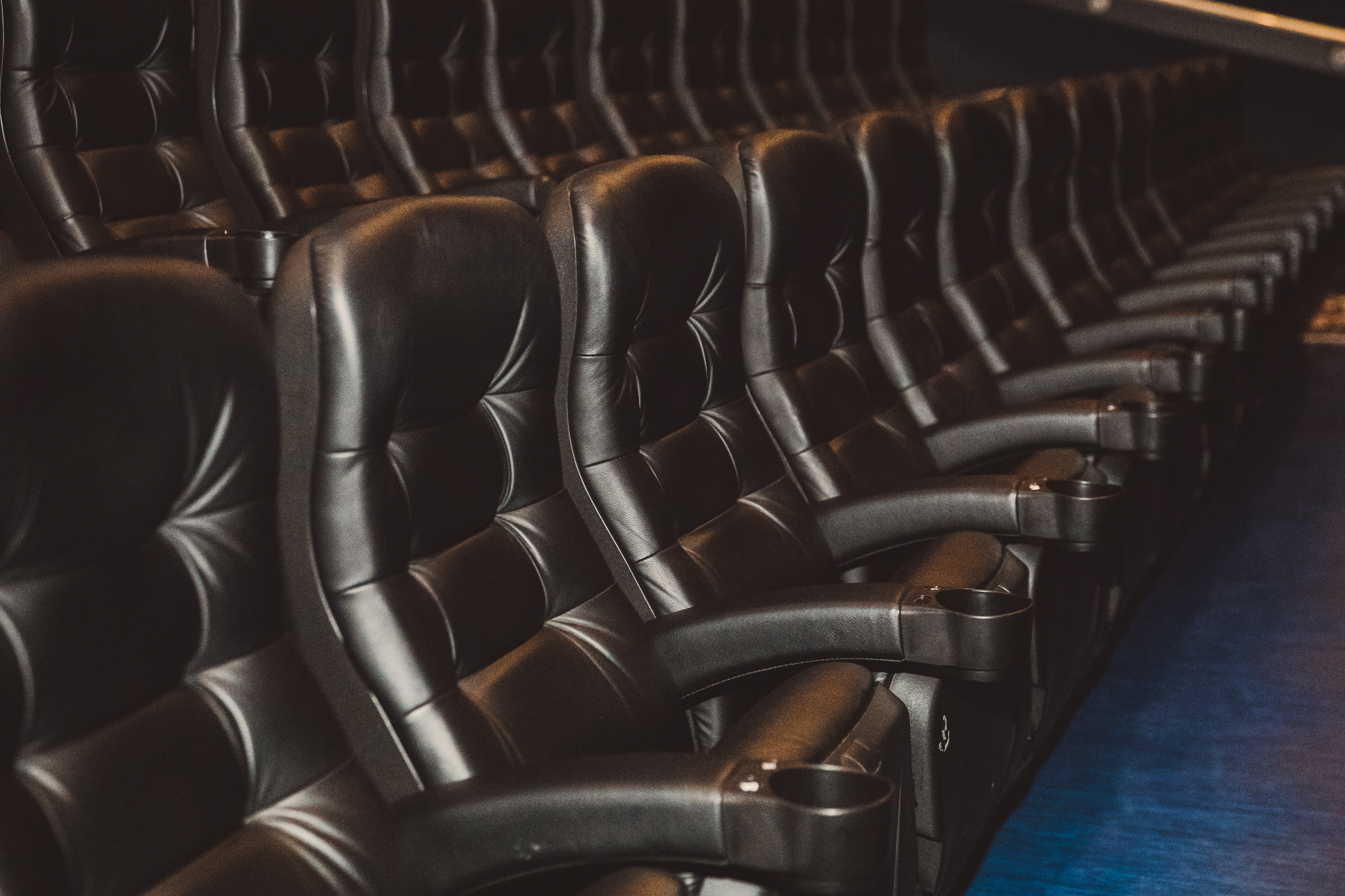 Plush black seating at Cineworld O2 Greenwich for stylish presentations and screenings.