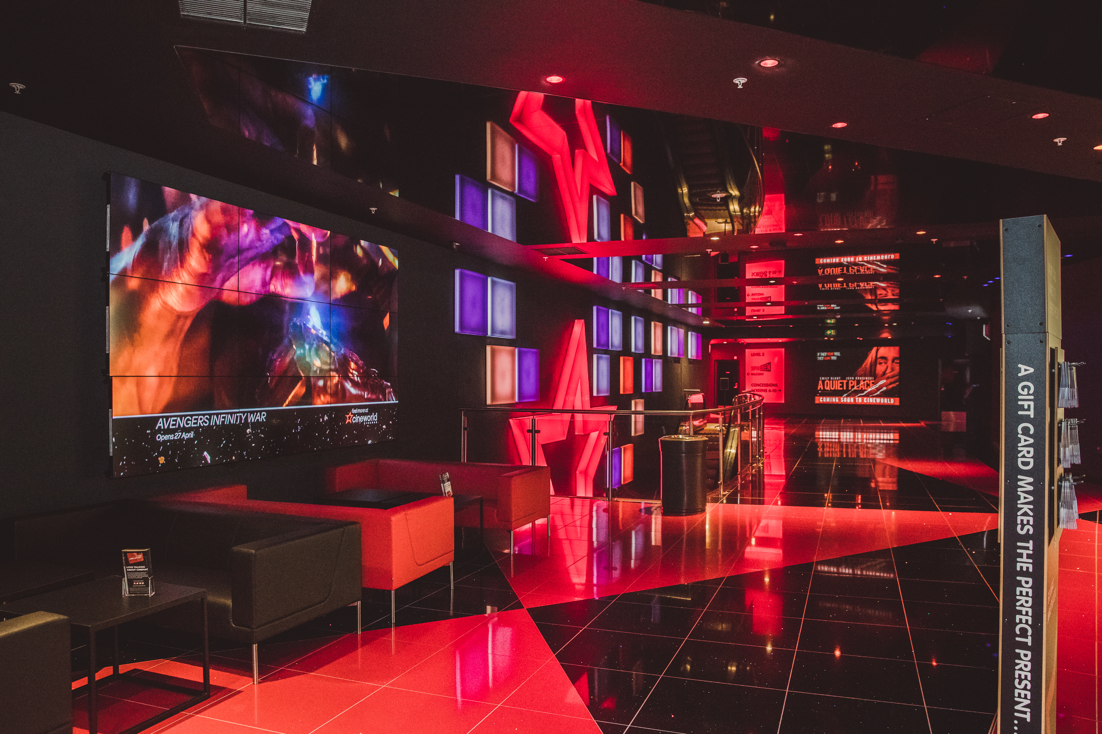 Cineworld O2 Greenwich event space with dynamic lighting for networking and presentations.