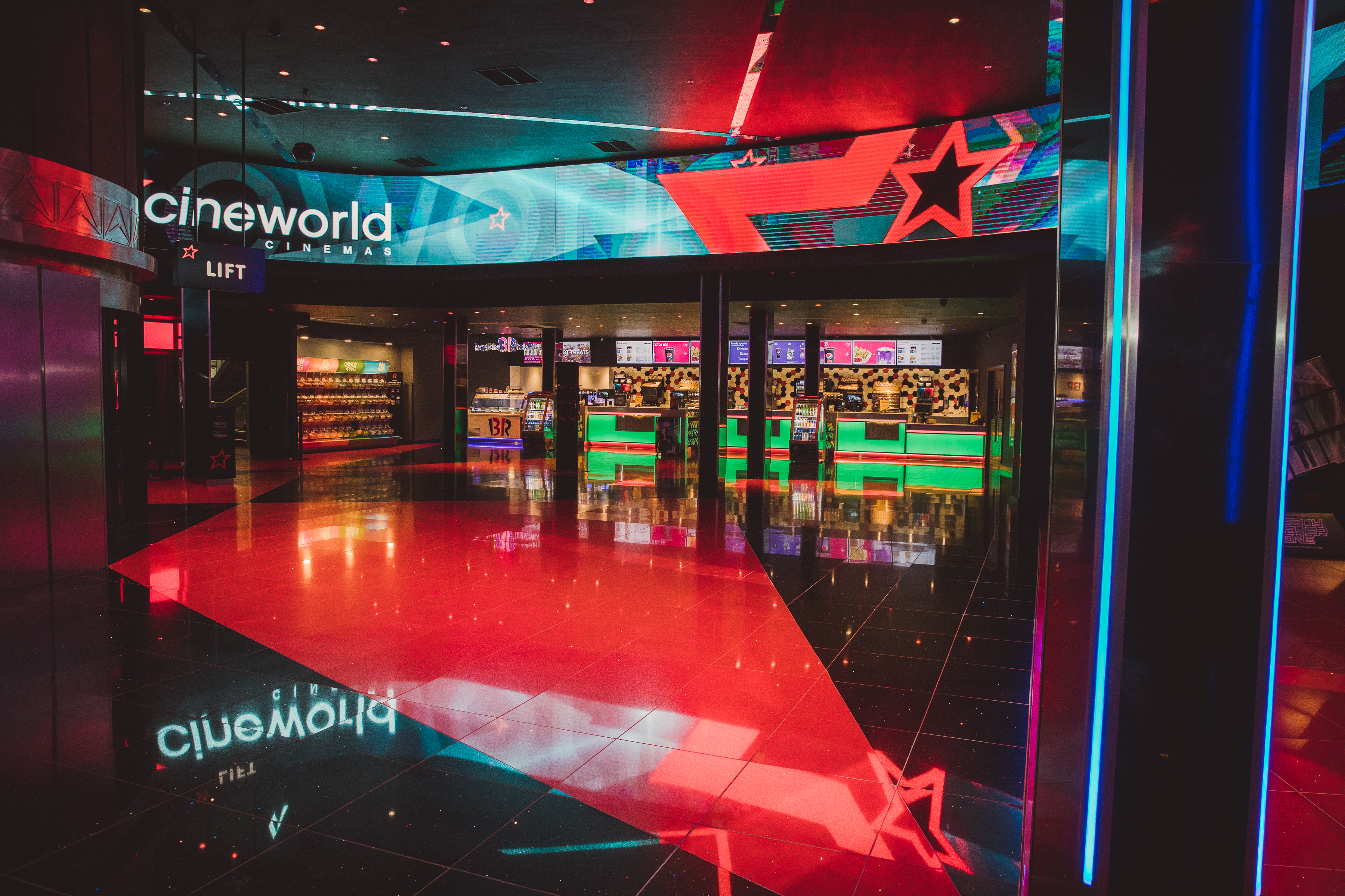 Cineworld O2 Greenwich lobby with vibrant lighting, ideal for events and networking.