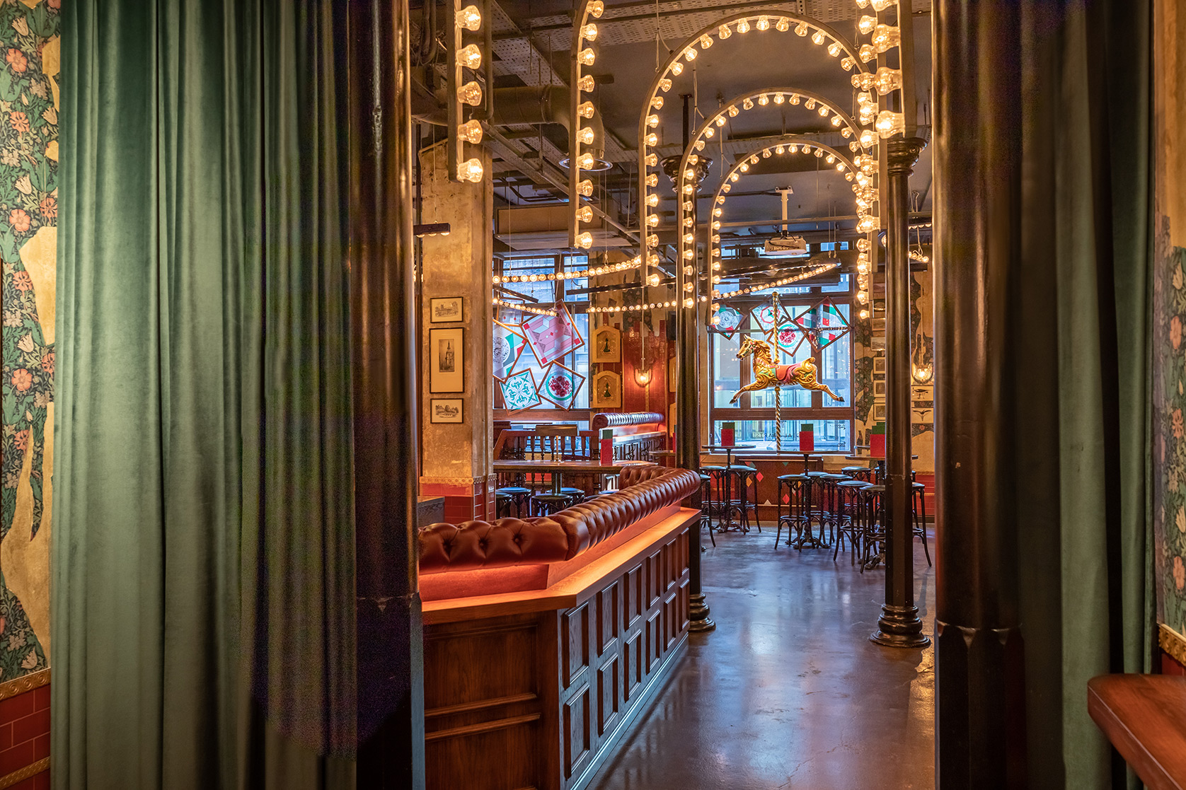 Stylish Flight Club Manchester venue with elegant archways, perfect for events.