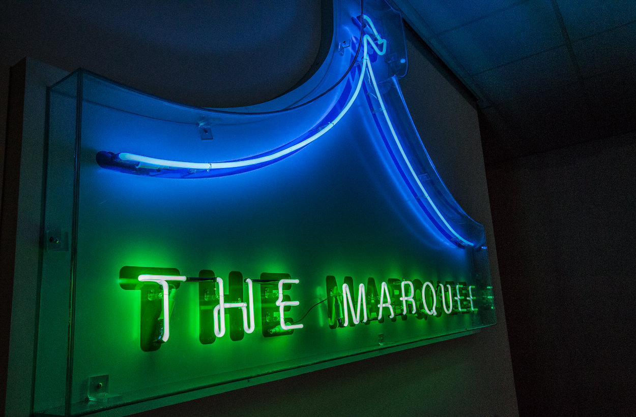 Vibrant neon sign at The Marquee, DW Stadium - ideal for events and gatherings.