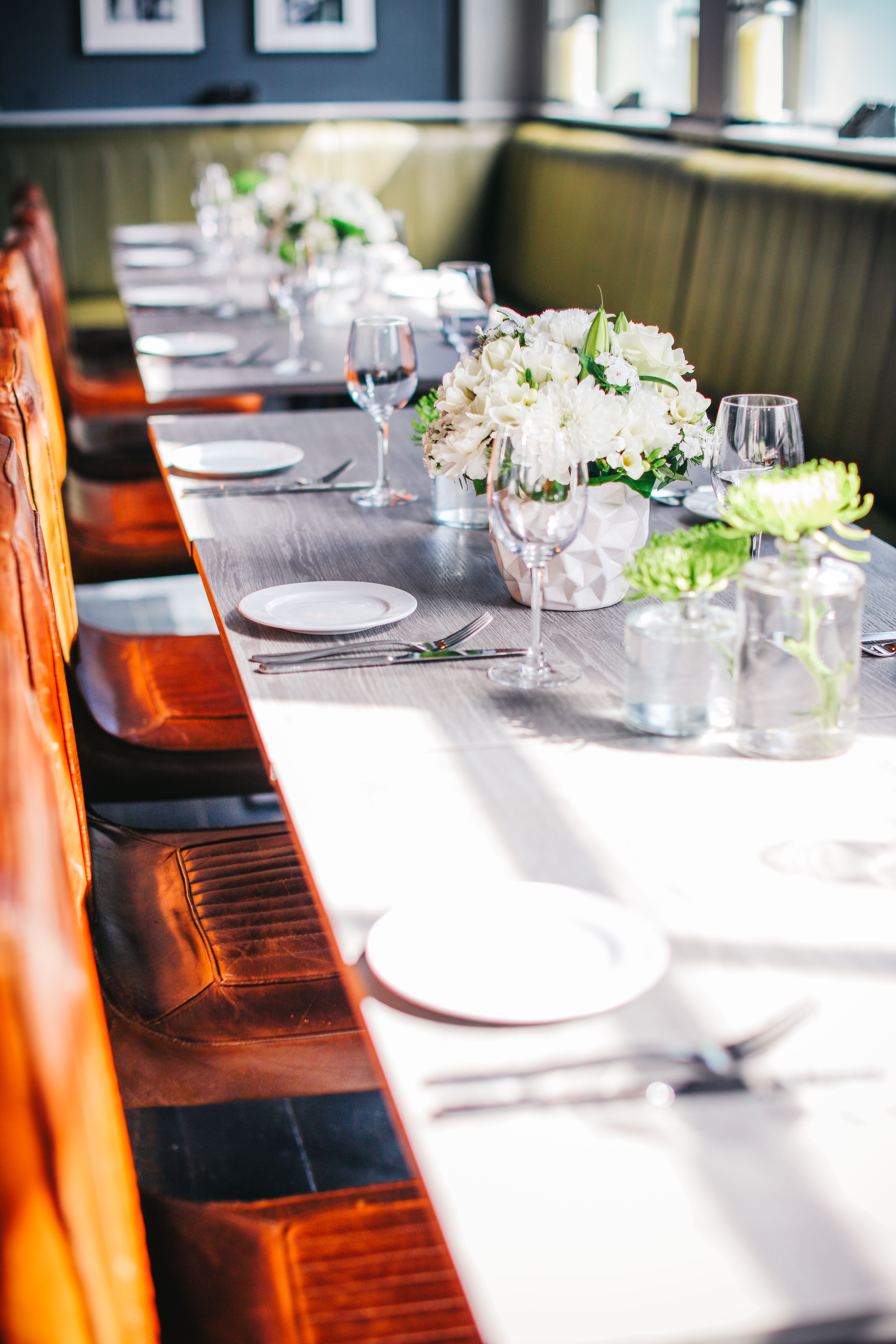 Elegant dining table with floral centerpiece for intimate events at Great Guns Social.