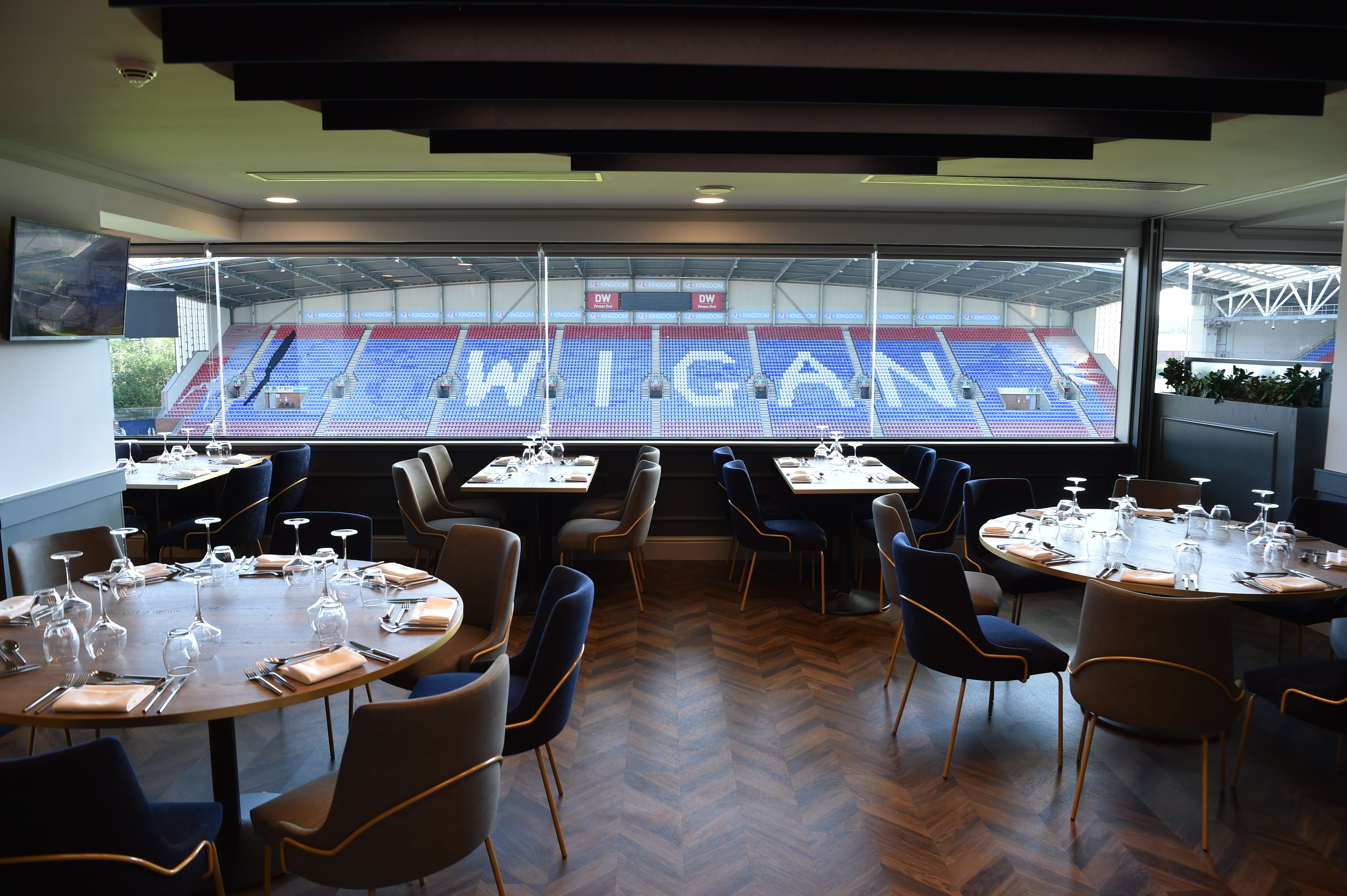 Elegant dining area in DW Stadium for corporate events and private dinners.