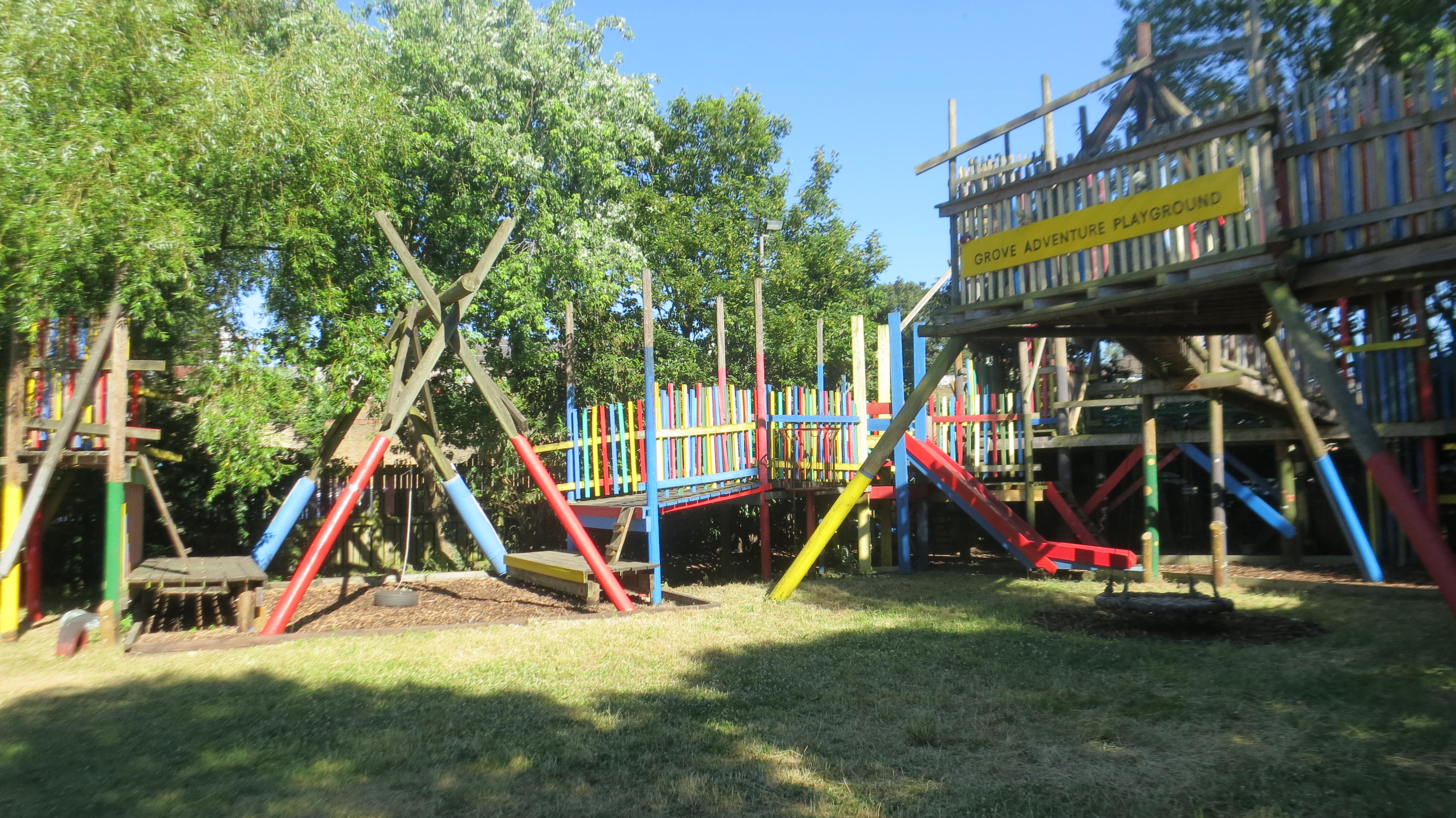 Vibrant outdoor playground with colorful structures for family events and team-building activities.
