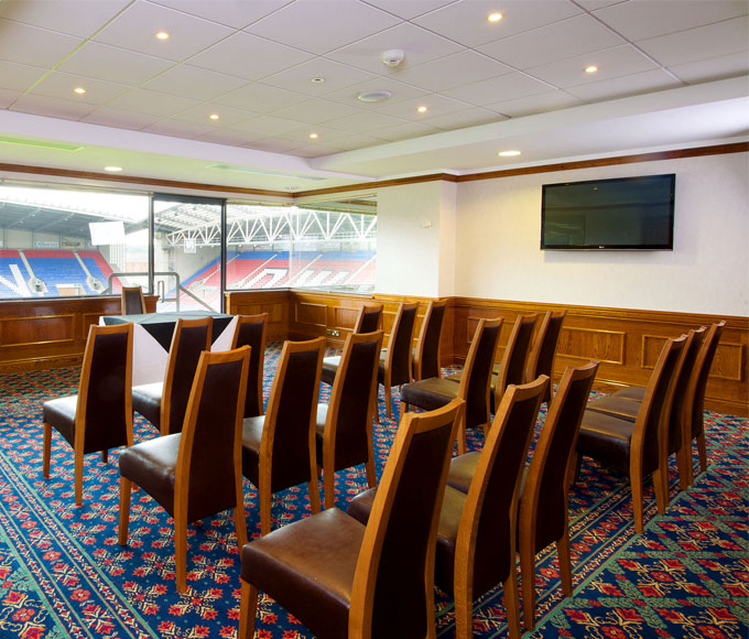 Dave Whelan President's Suite, elegant meeting room with stadium view for corporate events.