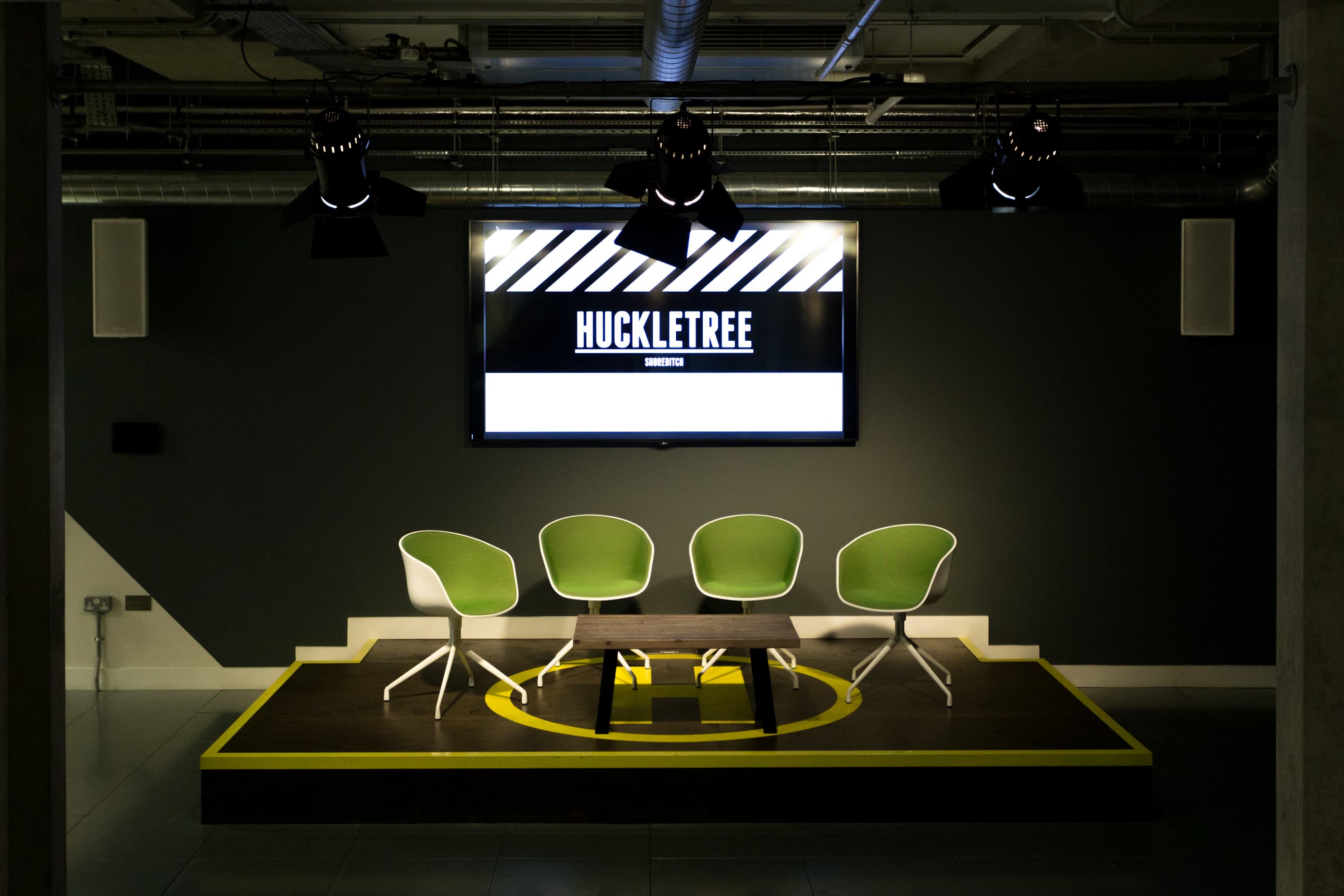 Modern event space in Huckletree Shoreditch with stylish chairs for corporate workshops.
