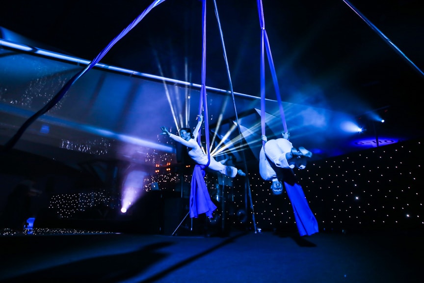 Aerial performance at Christmas party in Concorde Conference Centre, enhancing gala atmosphere.