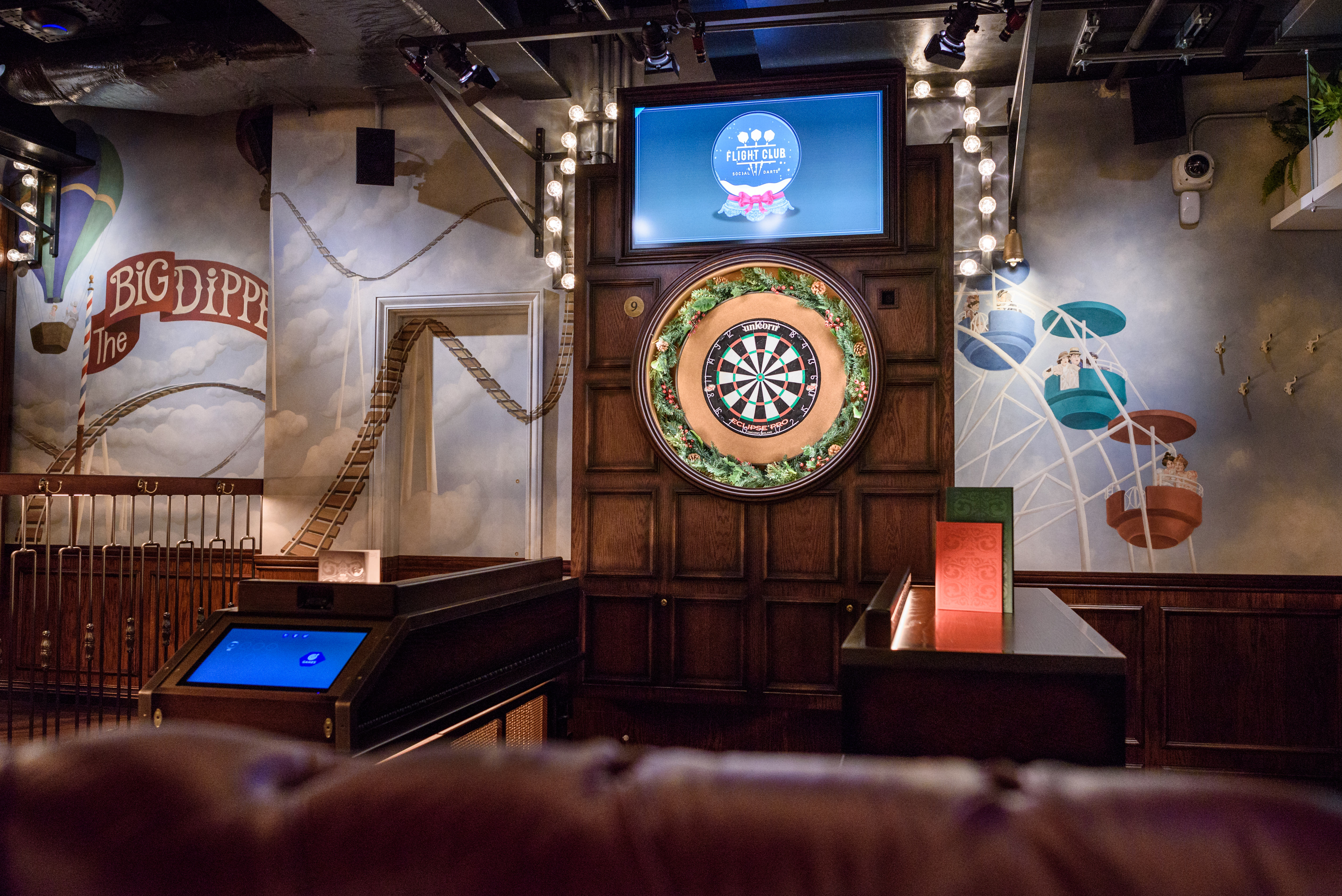 The Big Dipper at Flight Club Victoria: vibrant dartboard space for team-building events.
