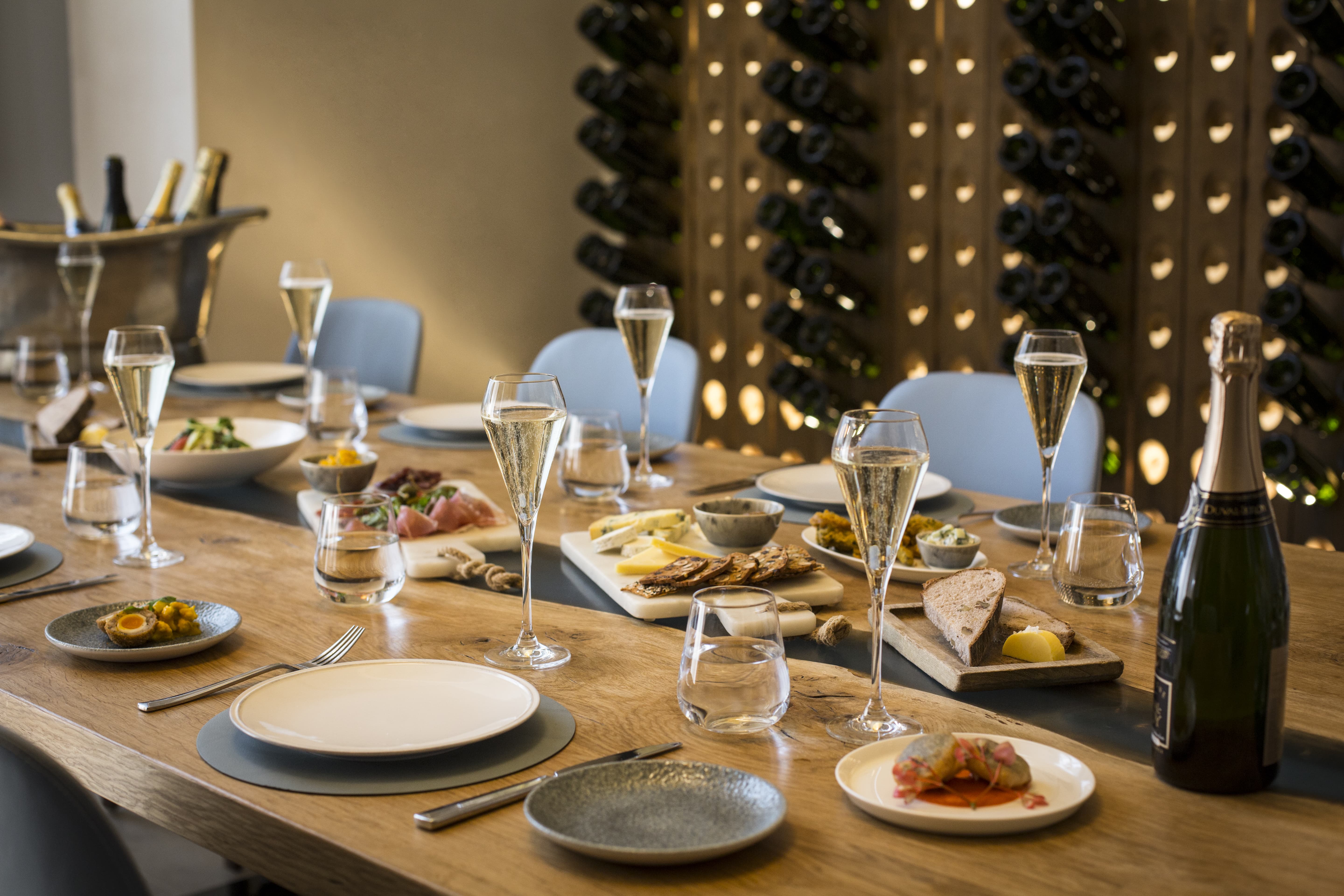 Elegant dining table with sparkling wine for corporate events at St Pancras Brasserie.