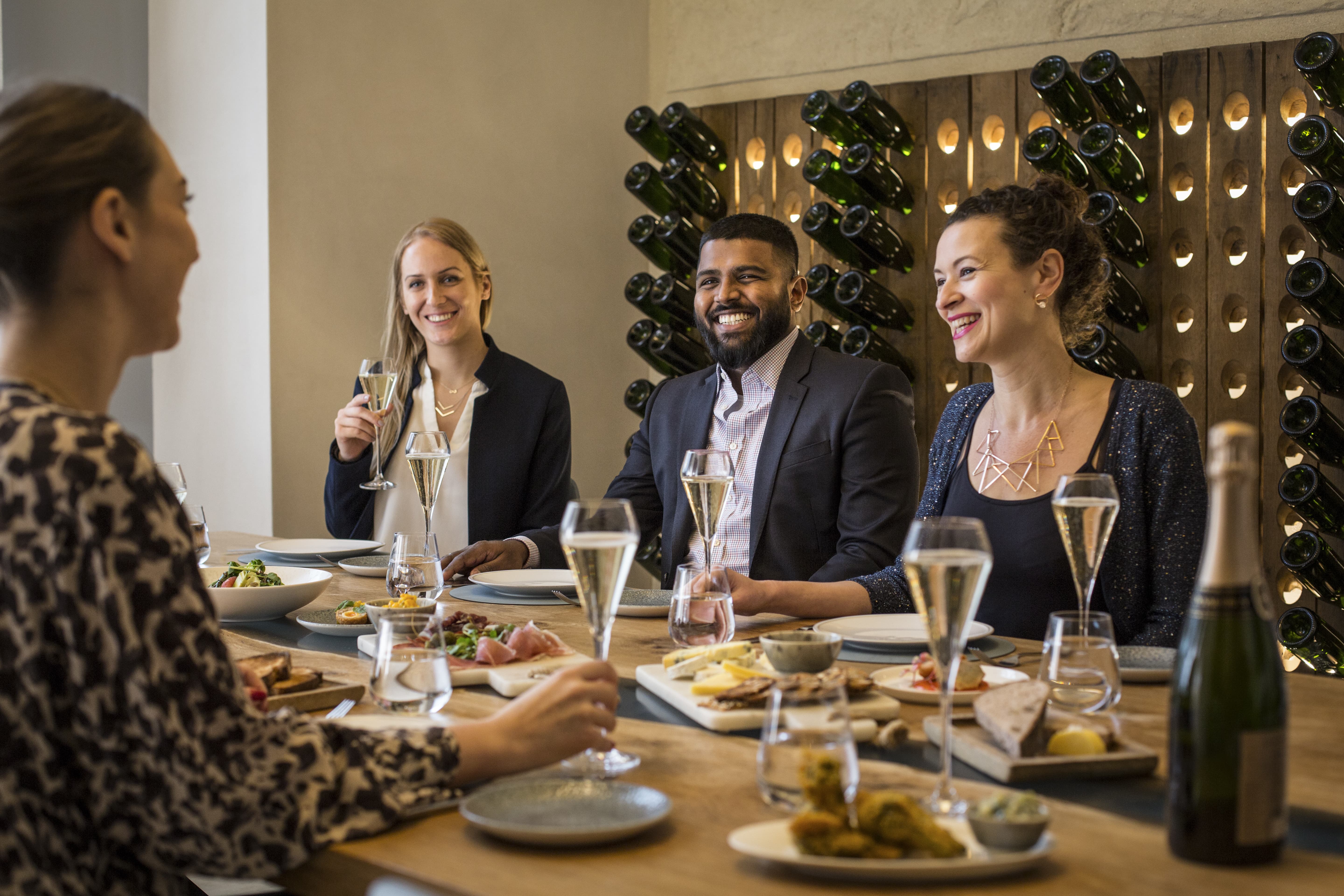 Networking event in upscale St Pancras Brasserie with elegant table settings.