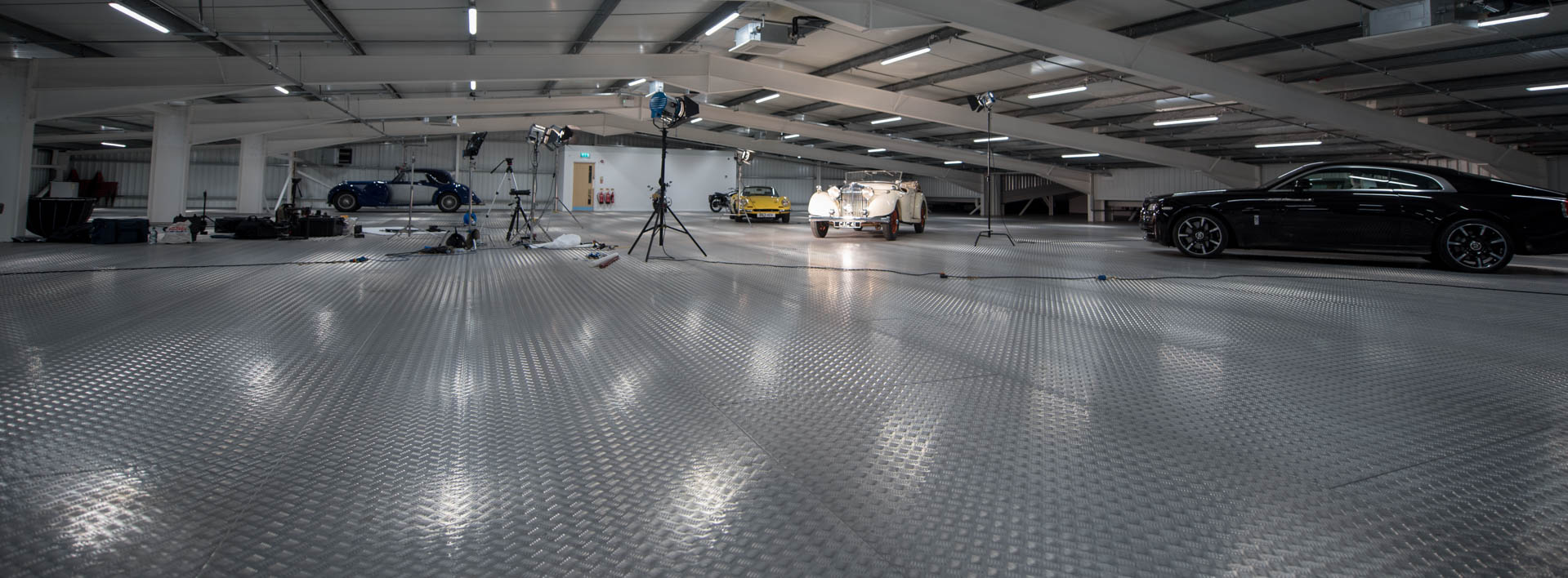 Spacious Studio 434 venue with polished floor for automotive events and product launches.