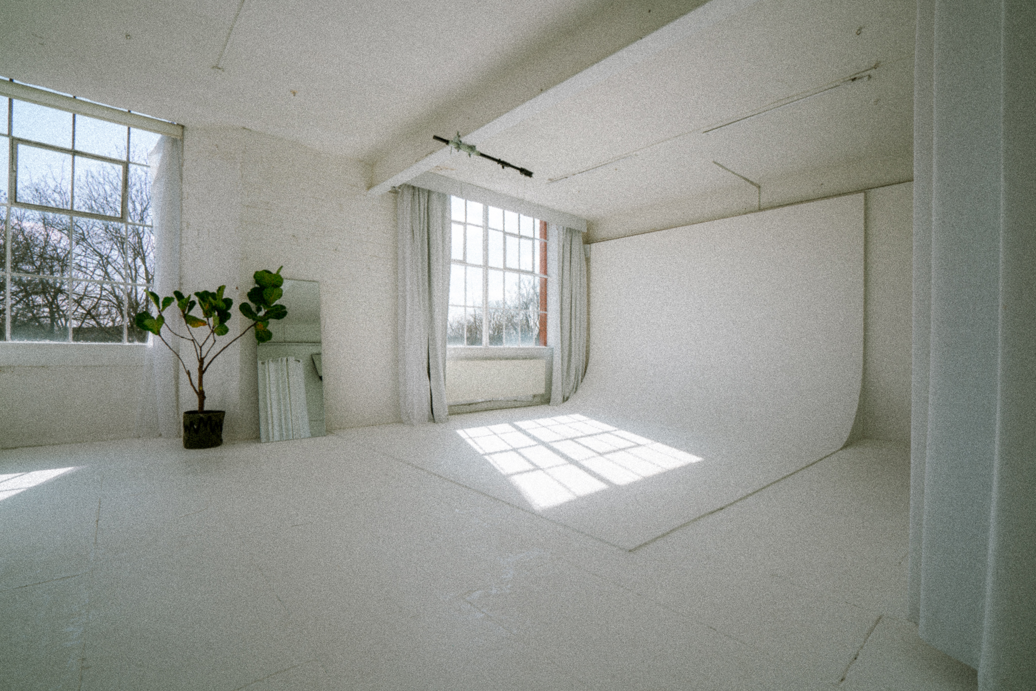 Tanzaro Photography Studio Manchester: White backdrop for professional product and workshop shoots.