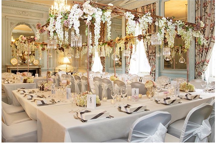 Wedgwood Dining Room banquet setting with floral decor, ideal for weddings and formal events.
