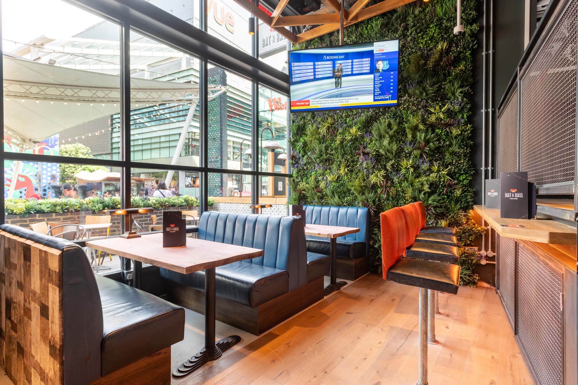 Modern venue with greenery for corporate events and Christmas parties in Bat & Ball.