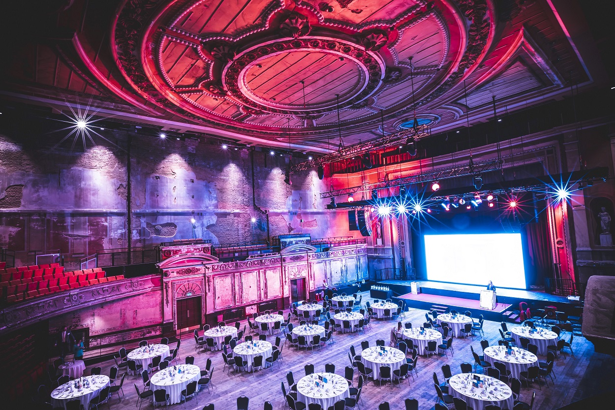Victorian Theatre at Alexandra Palace set for a formal gala dinner with elegant tables.