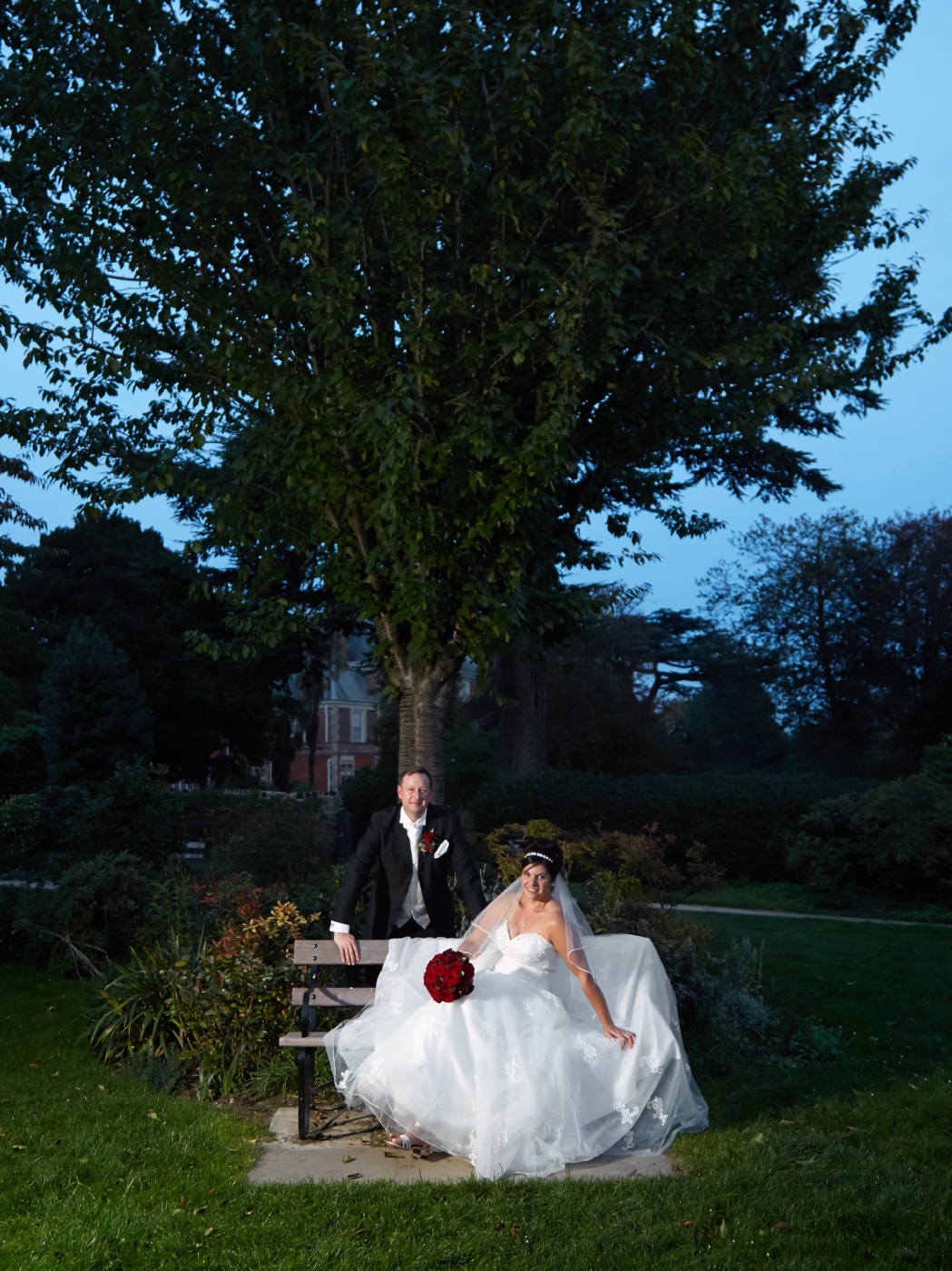Bride and groom in elegant attire at The Coach House, perfect for romantic weddings.
