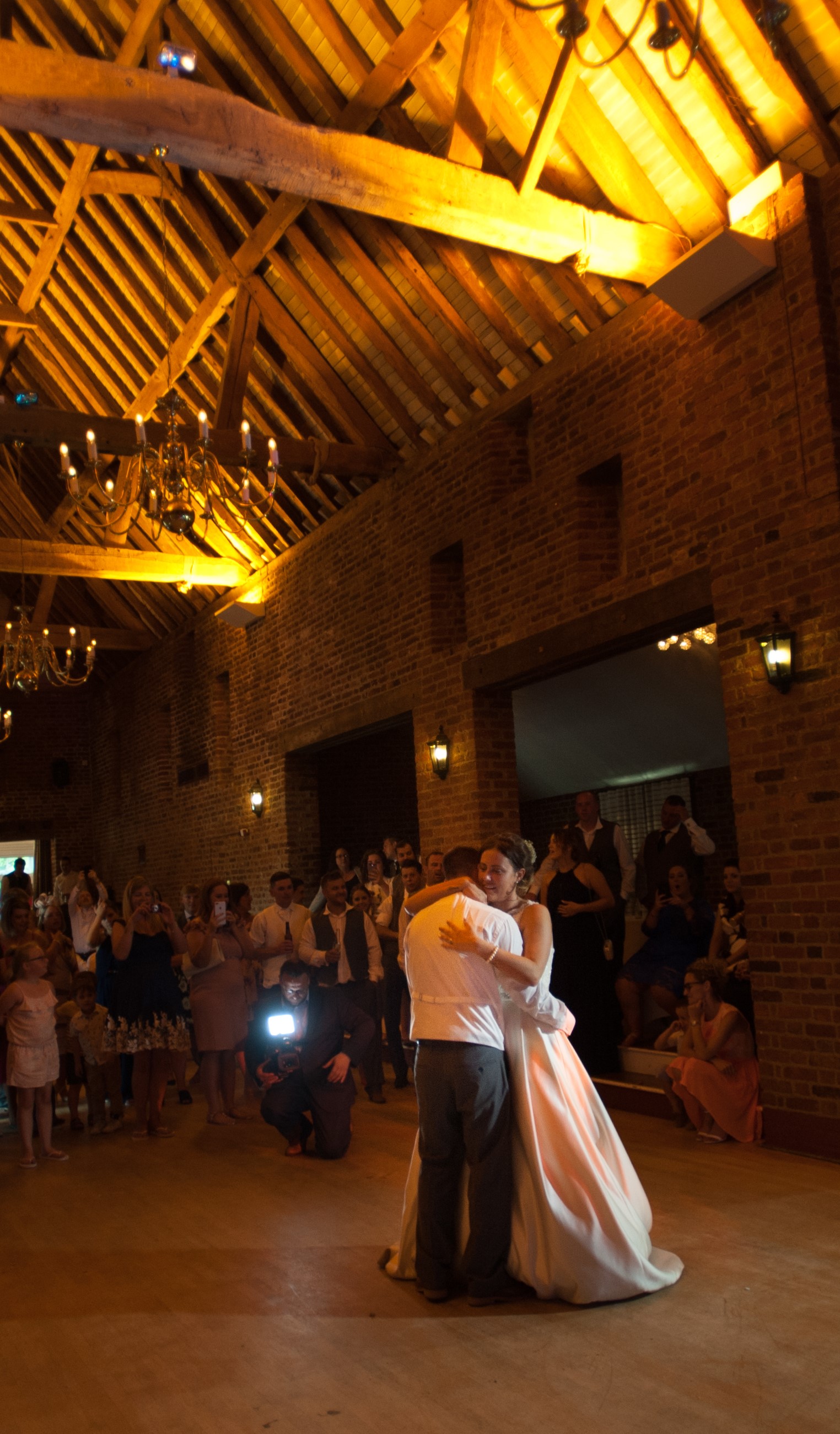The Coach House reception space with chandeliers, perfect for weddings and events.