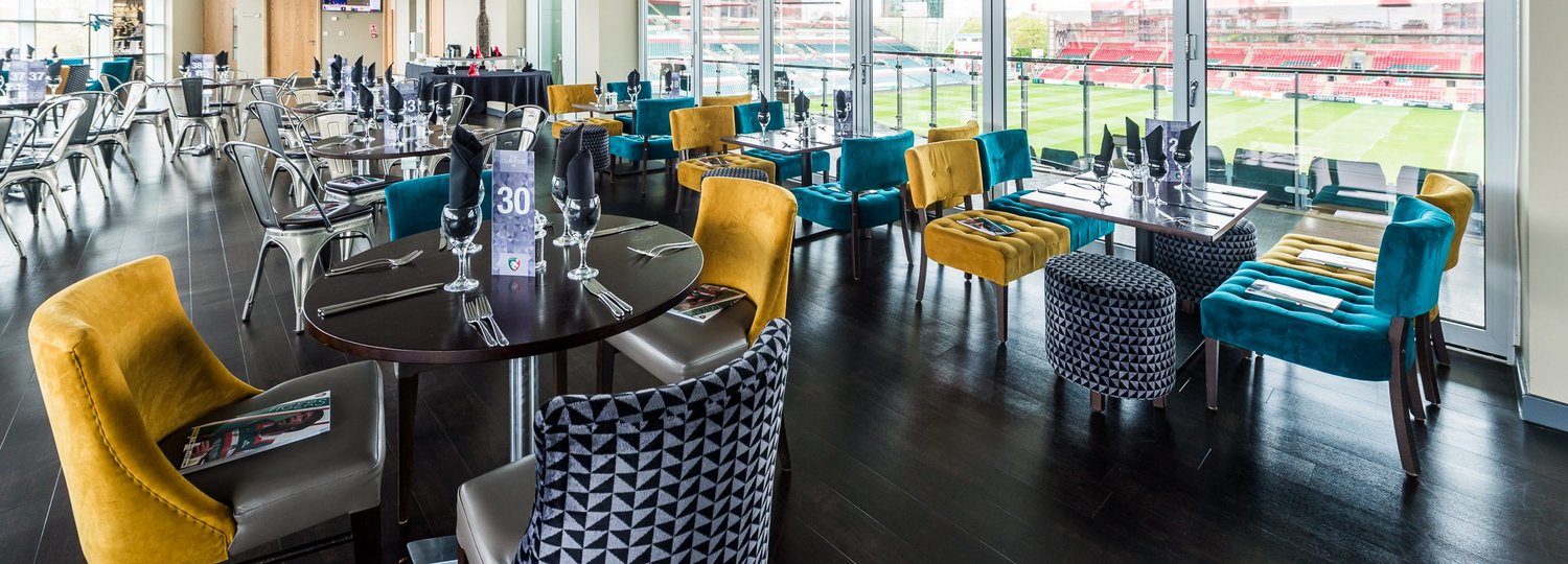 Modern Clubhouse Suite at Leicester Tigers Stadium, ideal for upscale meetings and events.