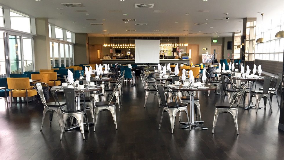 The Clubhouse Suite at Leicester Tigers Stadium, modern event space for meetings and banquets.