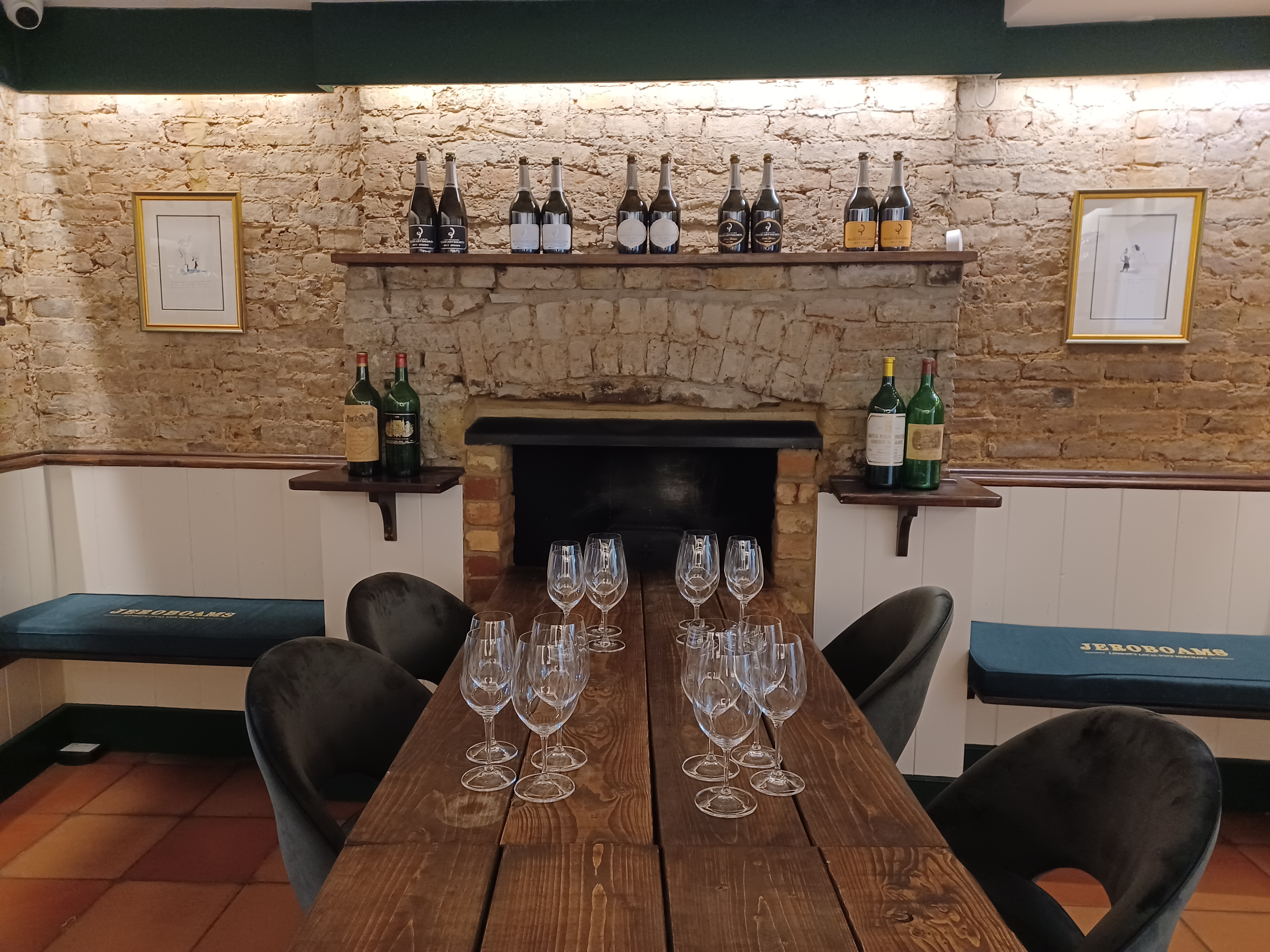 Cozy meeting space in Jeroboams Walton Cellar, ideal for wine tastings and gatherings.