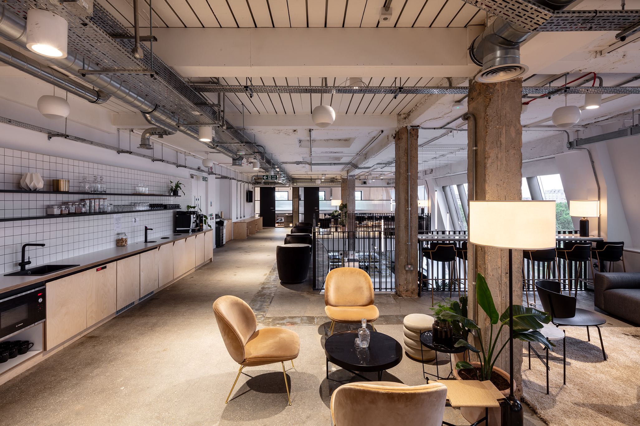 Modern open-concept meeting space with natural light for workshops and networking events.