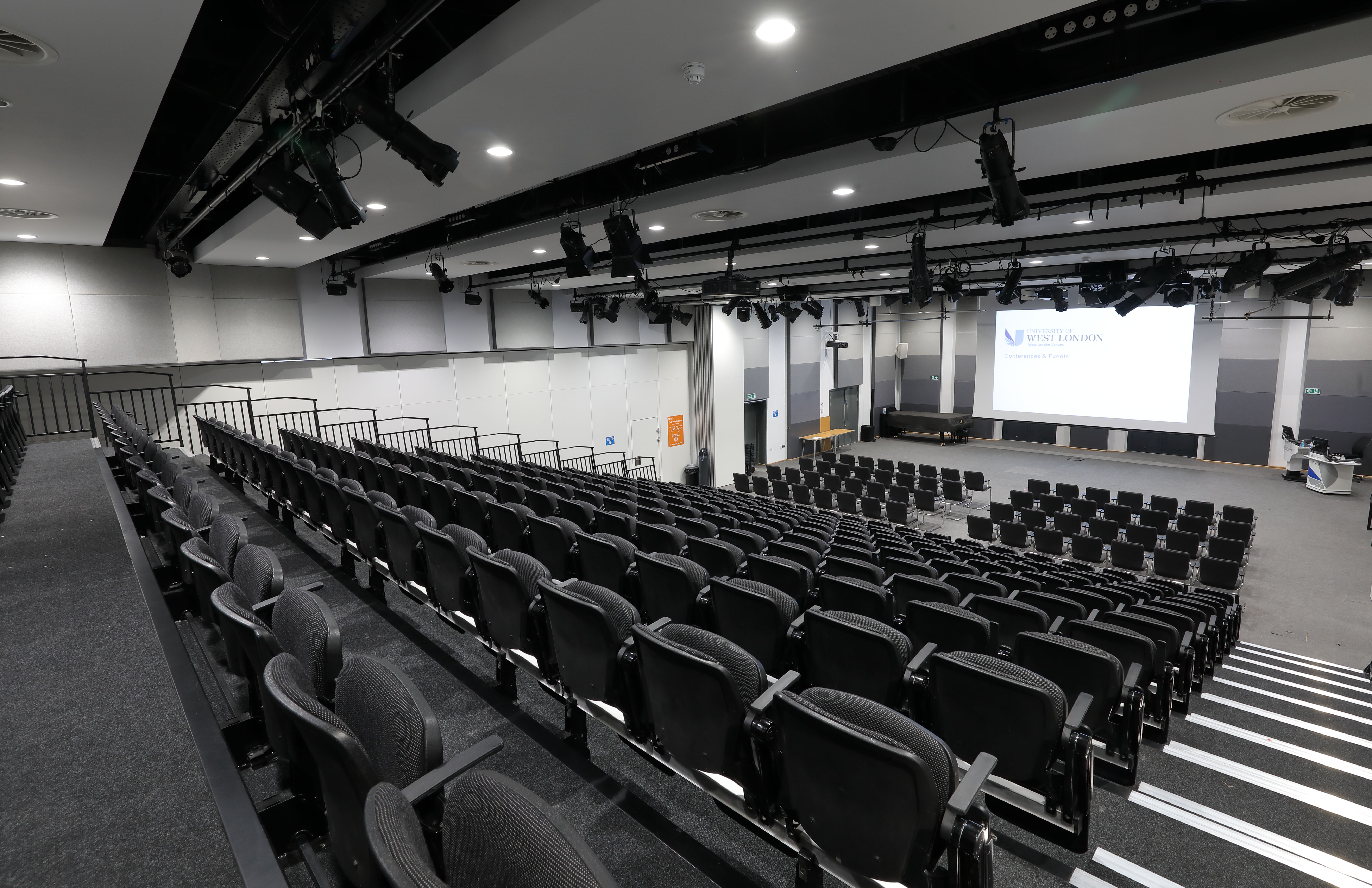 Weston Hall auditorium with tiered seating for conferences and seminars at UWL Ealing.
