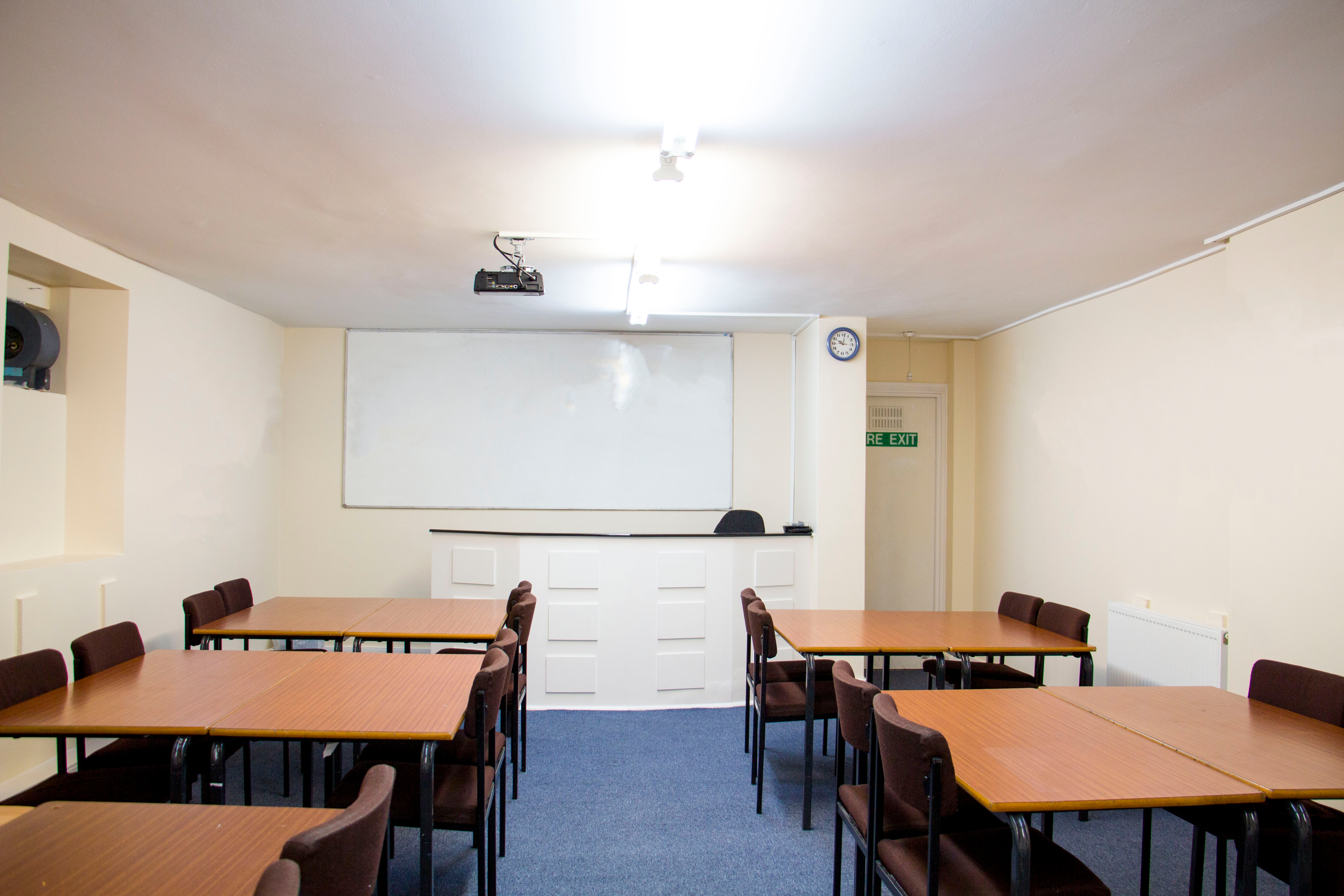 Versatile Meeting Room 106 at North London College, ideal for workshops and training sessions.