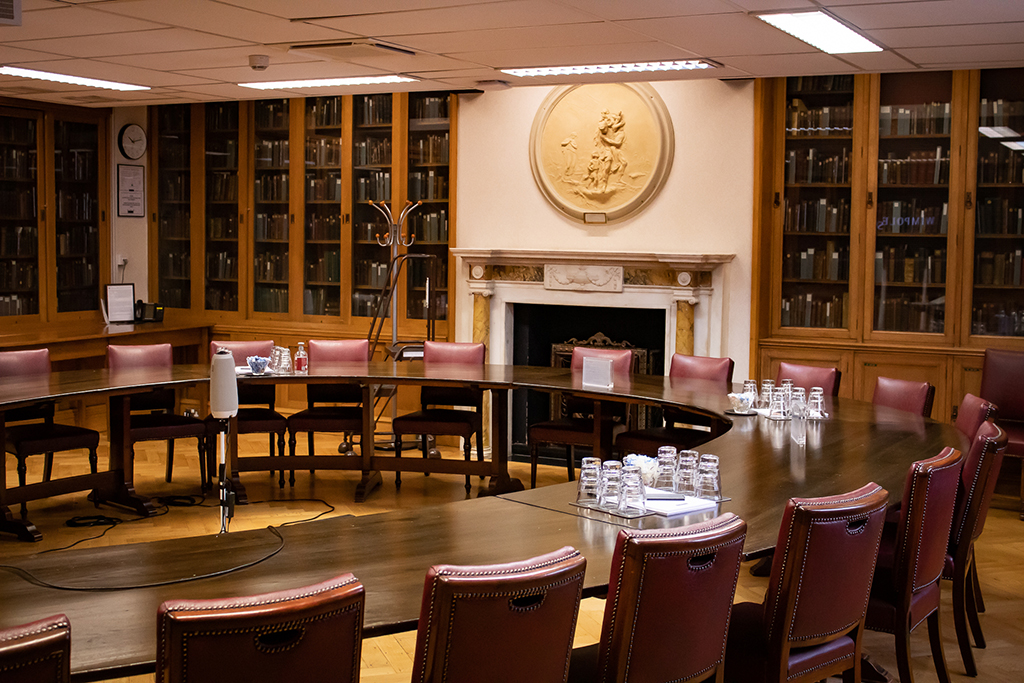 Marcus Beck Library meeting room with circular table, ideal for executive meetings and planning.