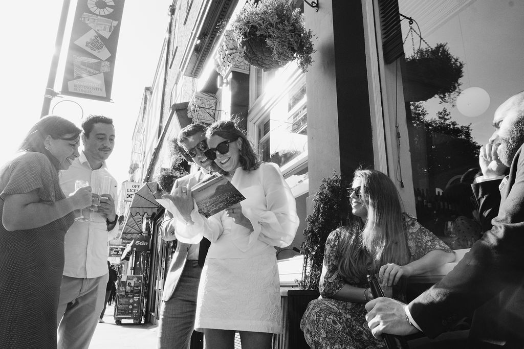 Lively outdoor gathering at The Upstairs Room, ideal for networking and casual meetings.