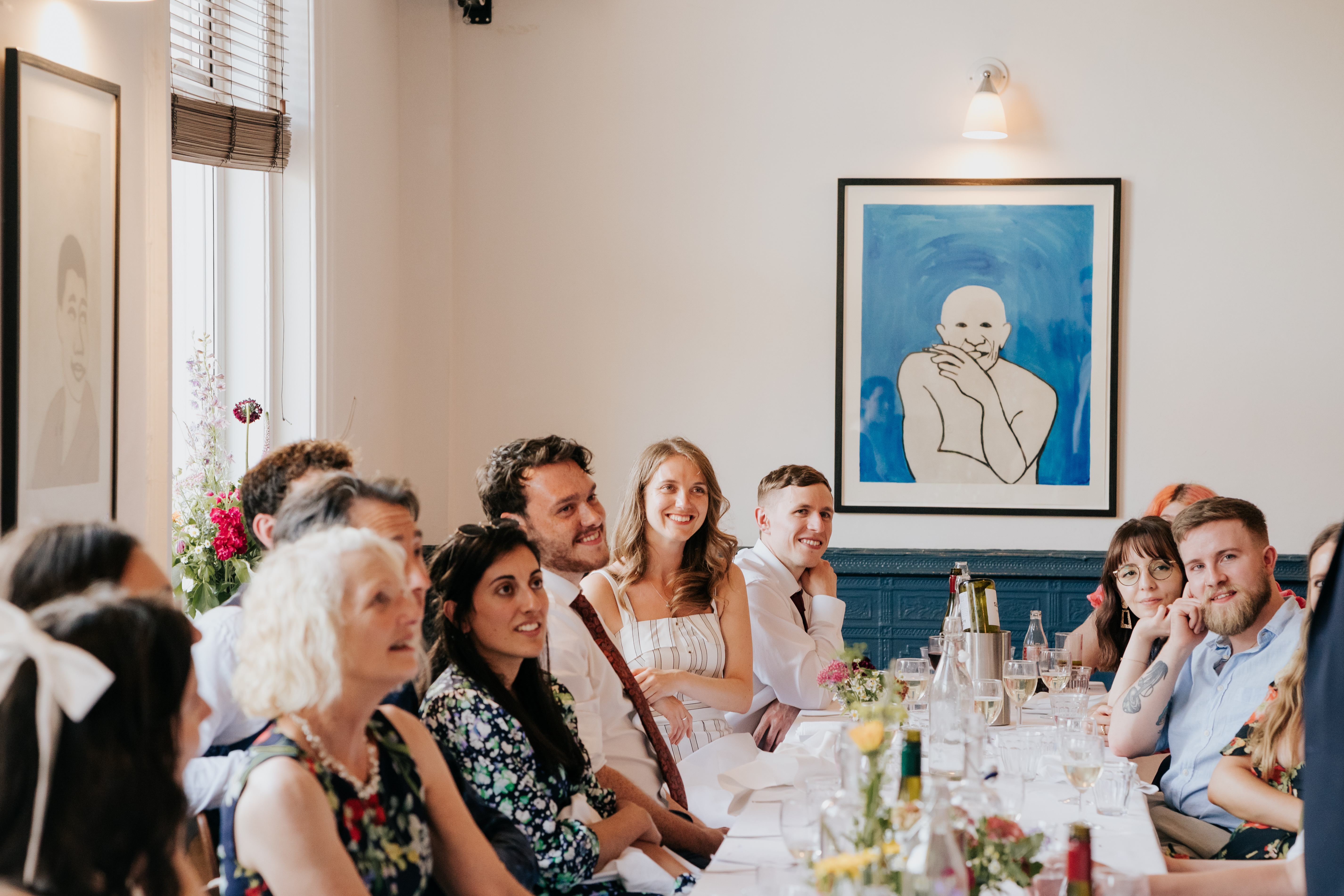 Corporate dinner in The Upstairs Room, Camberwell Arms; elegant decor and engaged attendees.