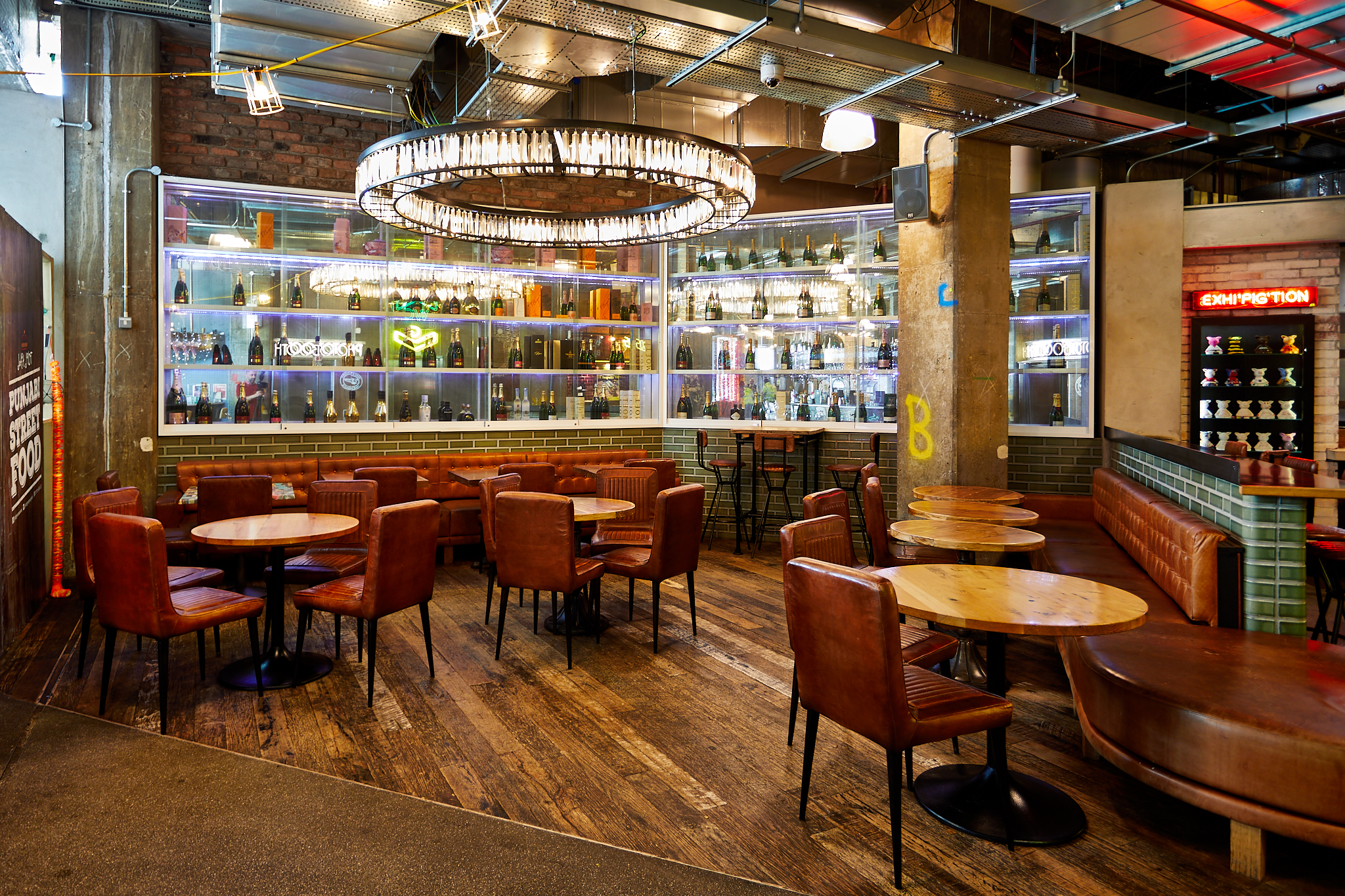 Stylish Trinity Kitchen venue with wooden floors, ideal for networking events and meetings.