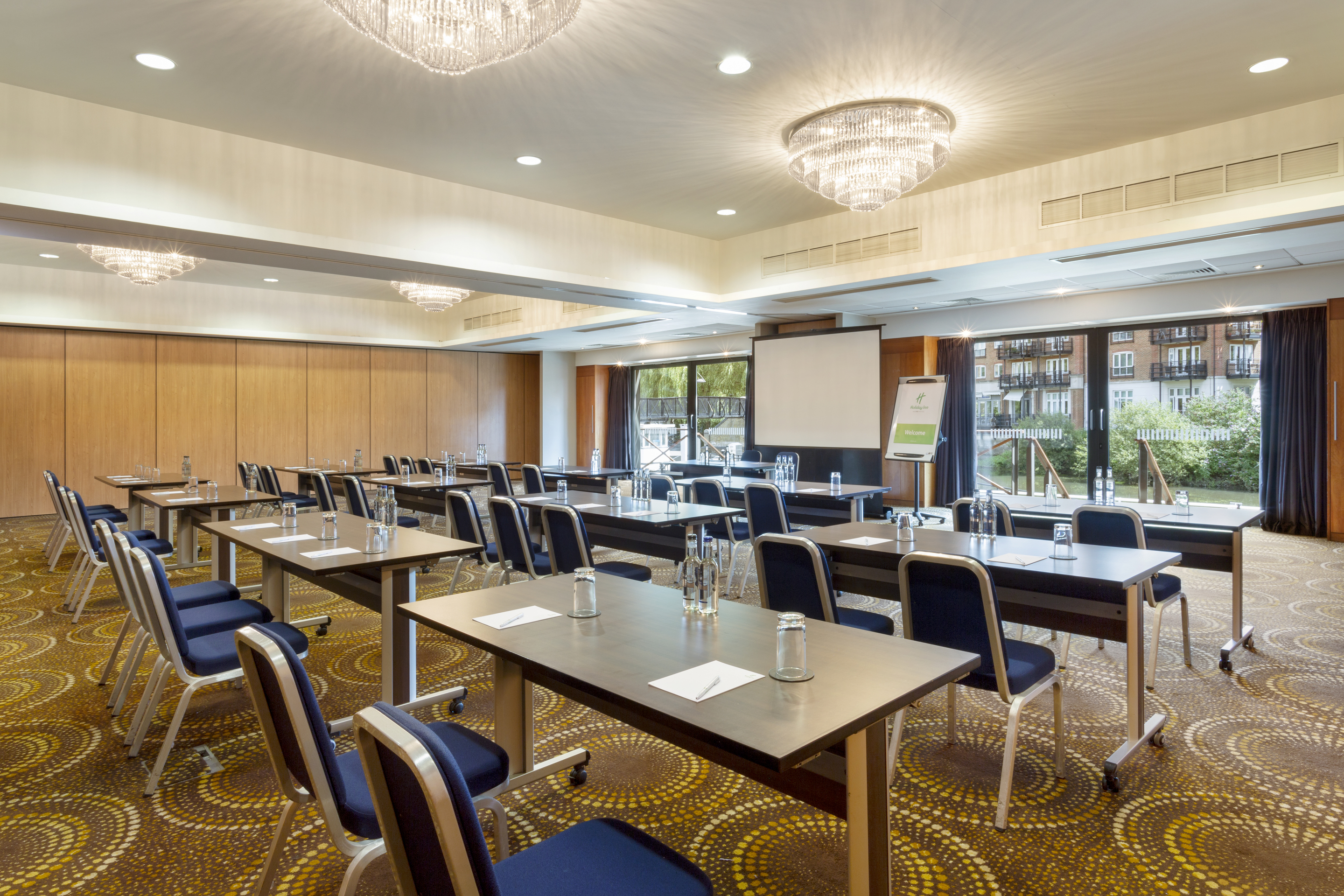 Waterfront Suite meeting room with natural light, ideal for corporate events and workshops.